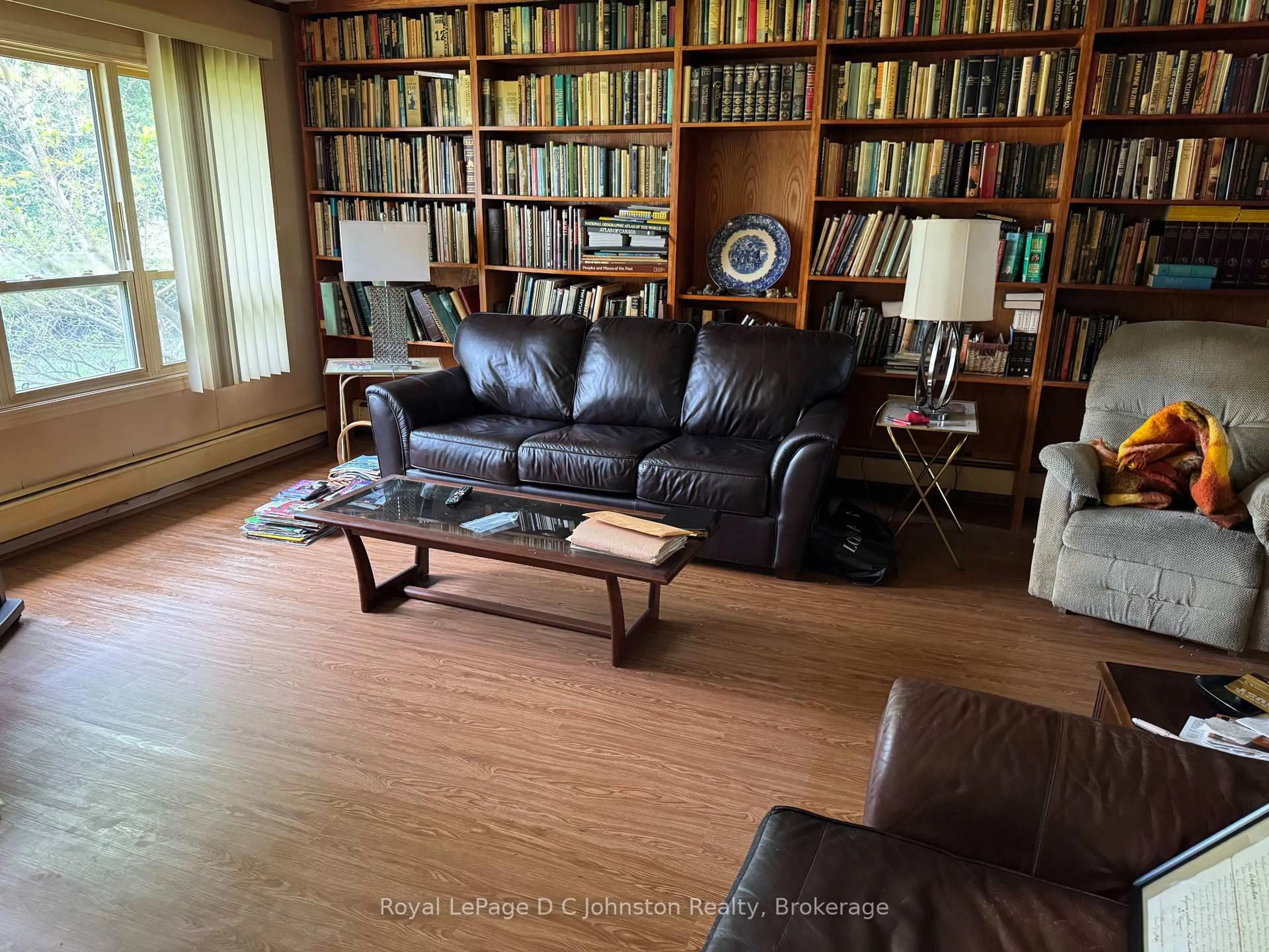Living room with furniture, wood/laminate floor for 191 Breadalbane St, Saugeen Shores Ontario N0H 2L0