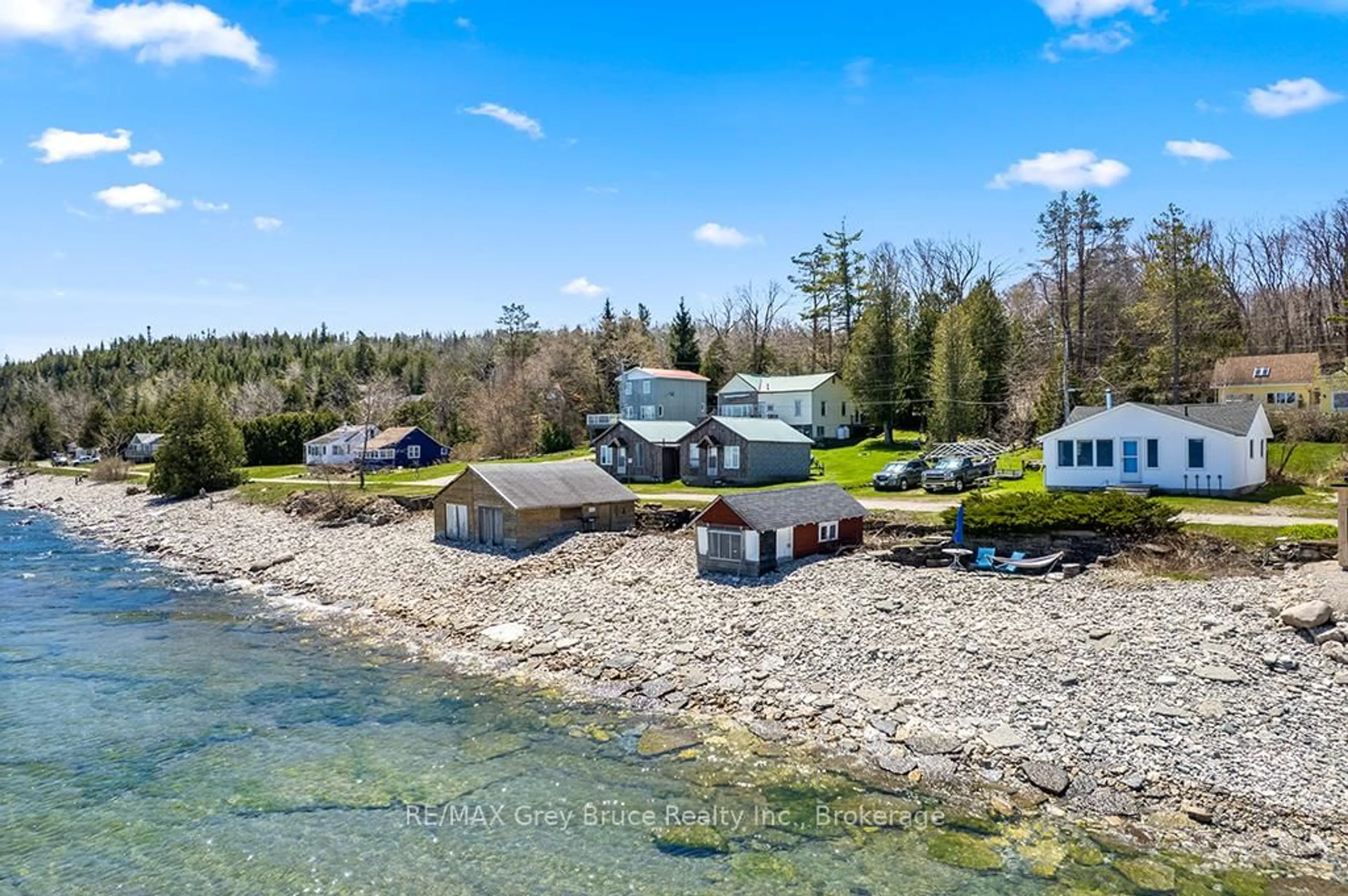 A pic from outside/outdoor area/front of a property/back of a property/a pic from drone, water/lake/river/ocean view for 8 Dock Lane, Northern Bruce Peninsula Ontario N0H 1Z0