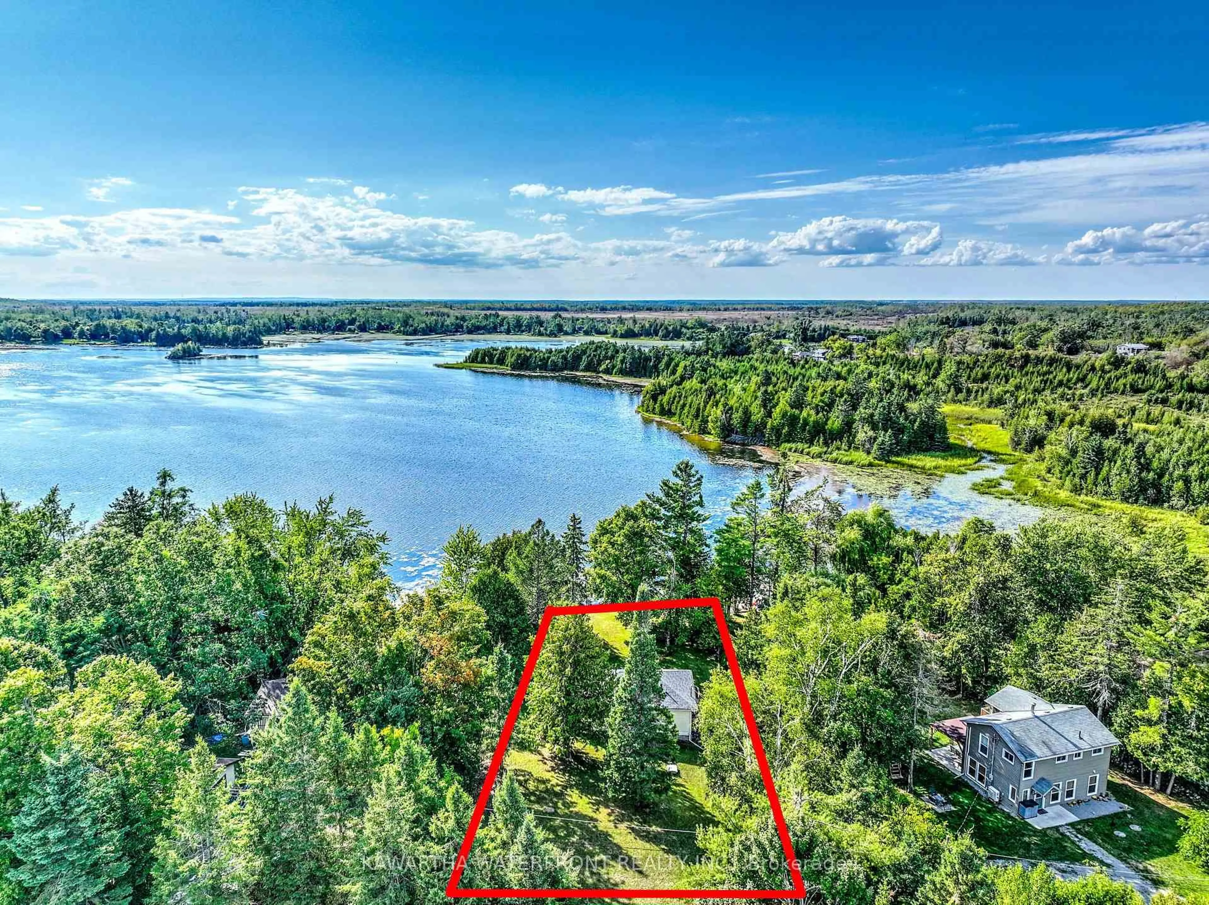 A pic from outside/outdoor area/front of a property/back of a property/a pic from drone, water/lake/river/ocean view for 71 Redcap Beach Lane, Kawartha Lakes Ontario K0M 2B0
