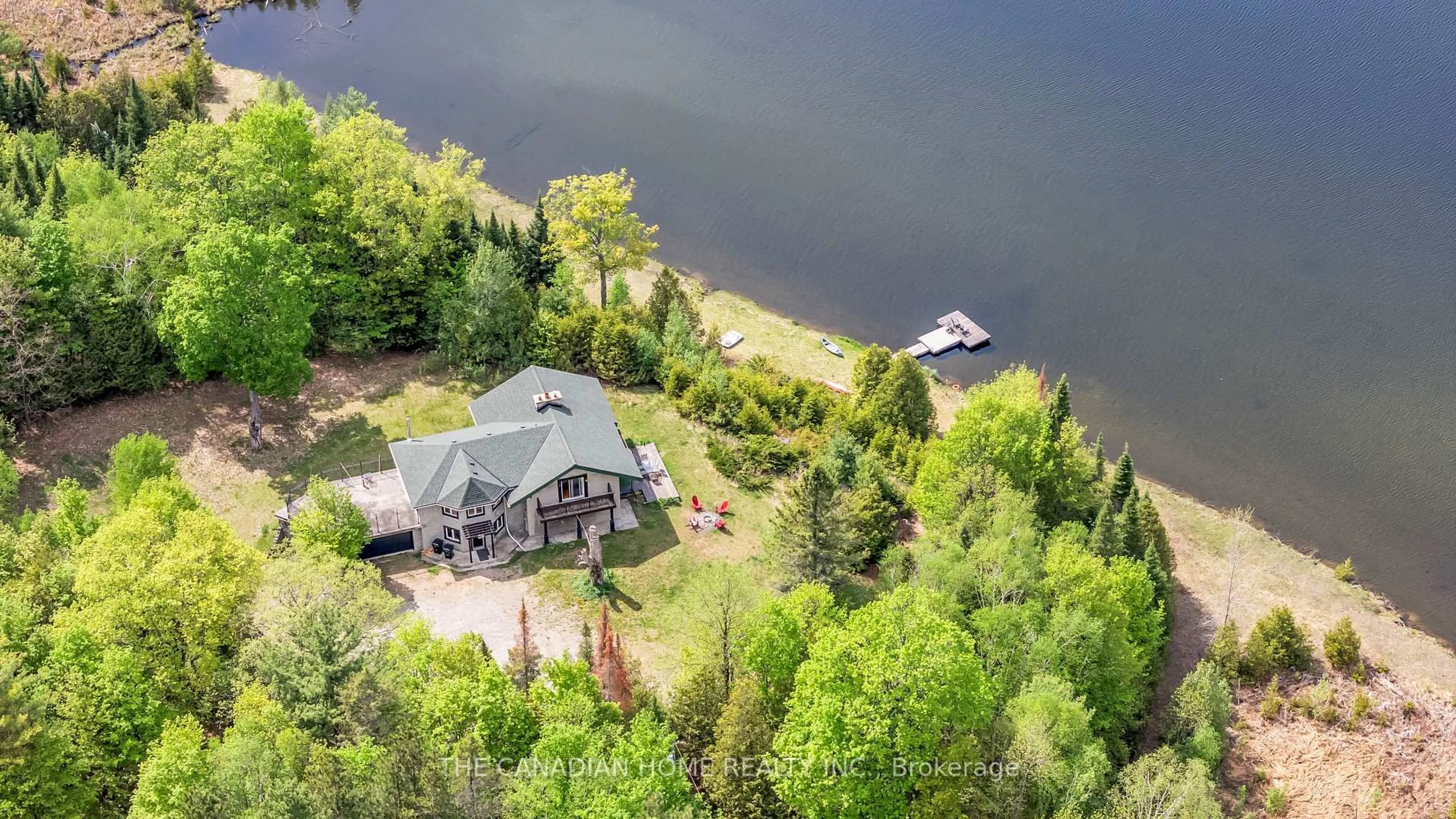 A pic from outside/outdoor area/front of a property/back of a property/a pic from drone, water/lake/river/ocean view for 5451 ARDEN Rd, Arden Ontario K0H 1B0