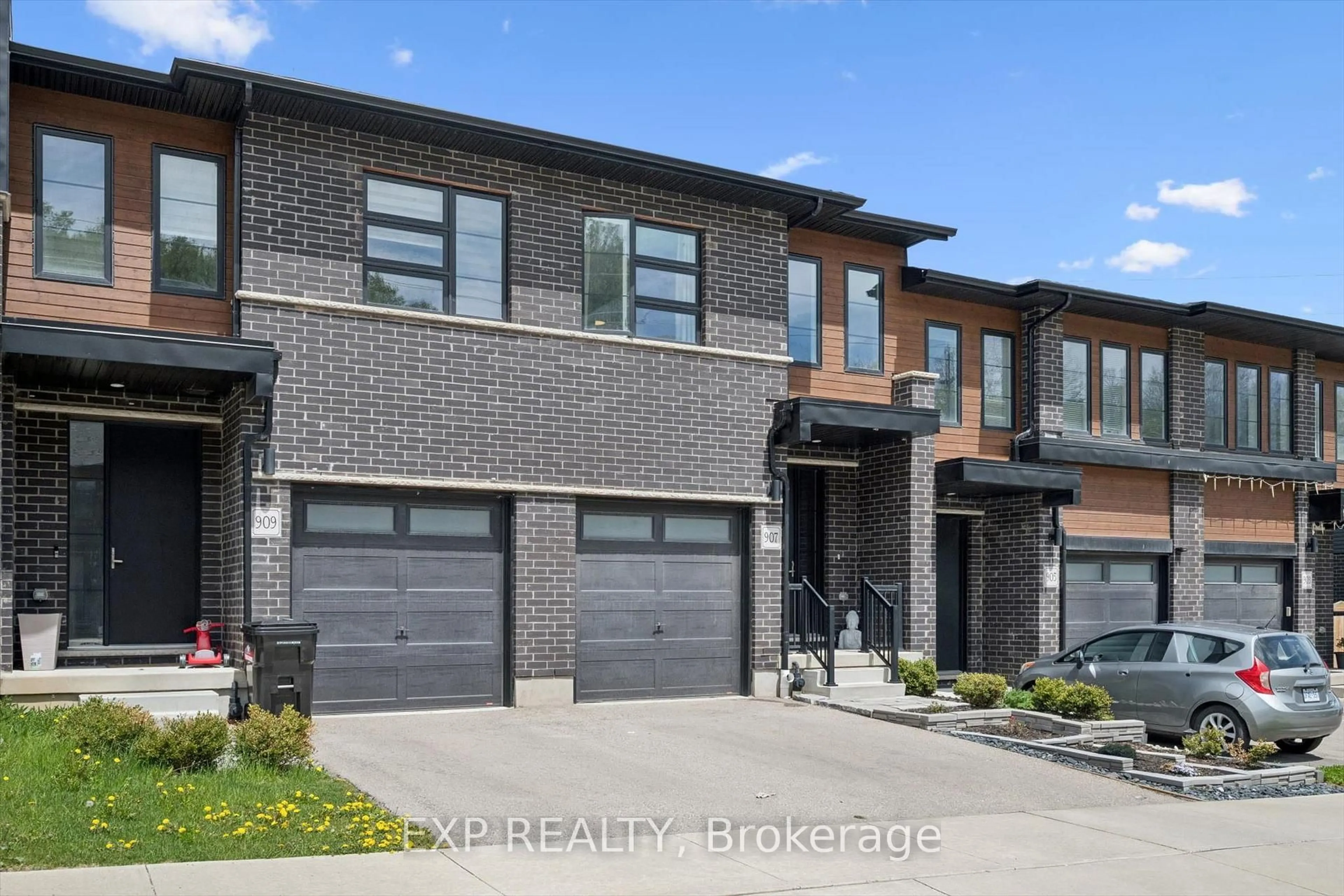 Home with brick exterior material, street for 907 Robert Ferrie Dr, Kitchener Ontario N2R 0P2