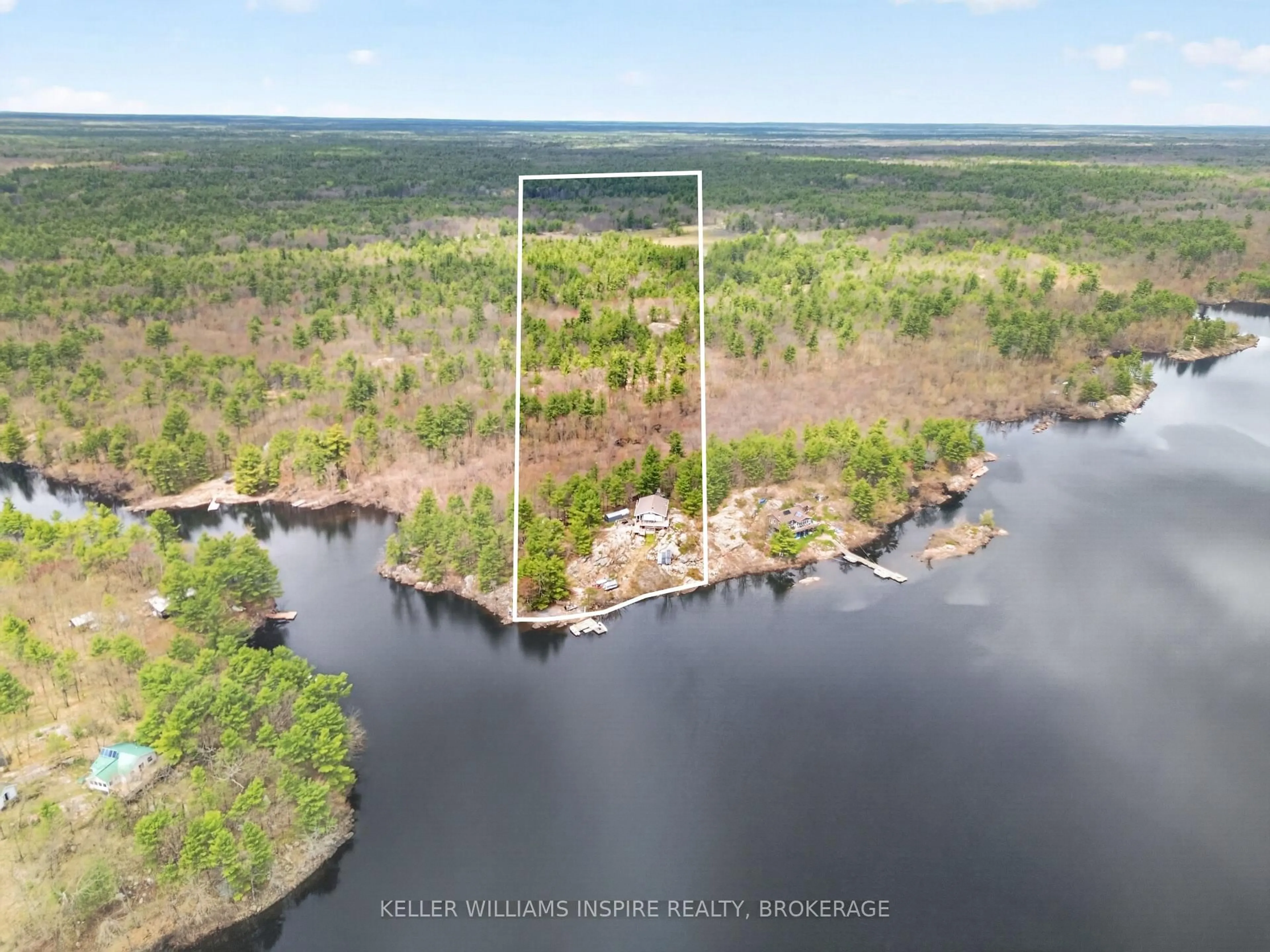 A pic from outside/outdoor area/front of a property/back of a property/a pic from drone, water/lake/river/ocean view for 2526 Sheffield Long Lake, Stone Mills Ontario K0K 1W0