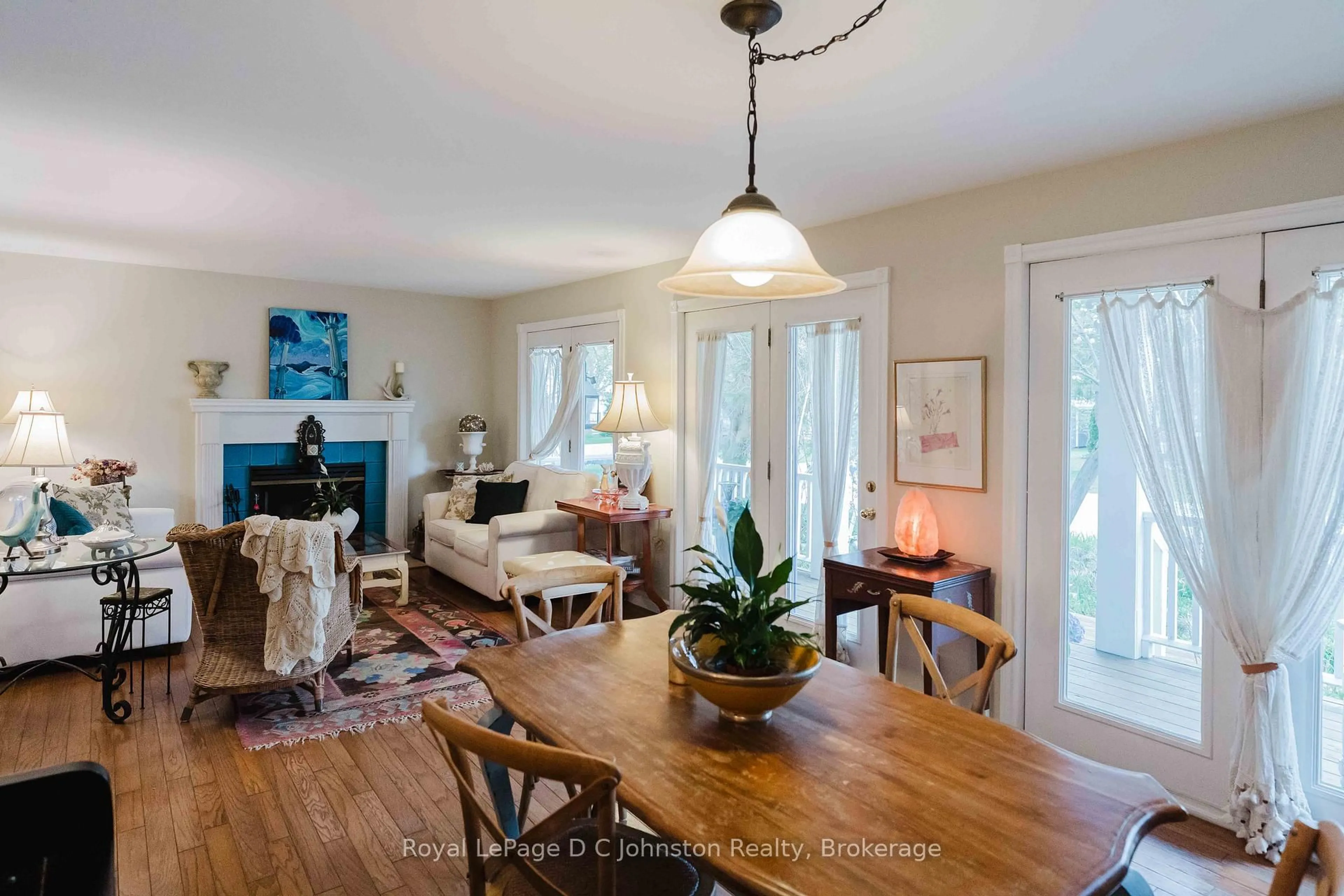 Living room with furniture, wood/laminate floor for 383 McNabb St #Unit 123, Saugeen Shores Ontario N0H 2L0
