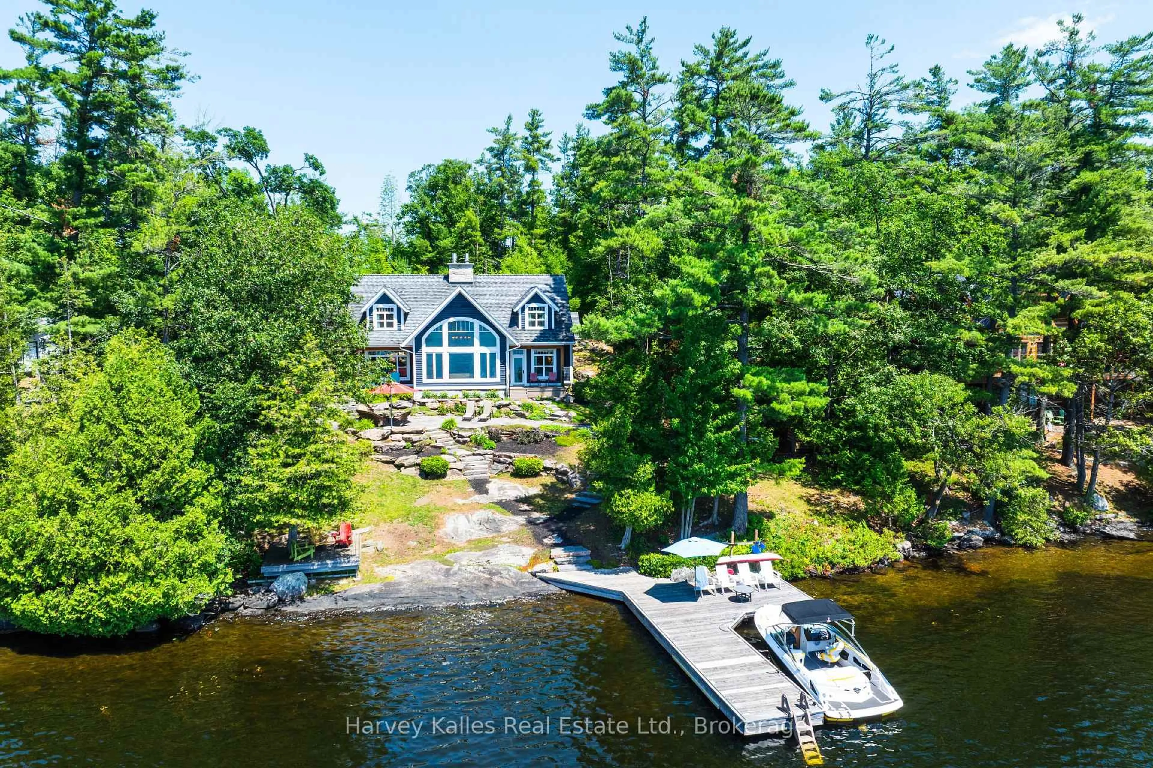 A pic from outside/outdoor area/front of a property/back of a property/a pic from drone, water/lake/river/ocean view for 1190 Parkers Point Rd, Gravenhurst Ontario P1P 1R2