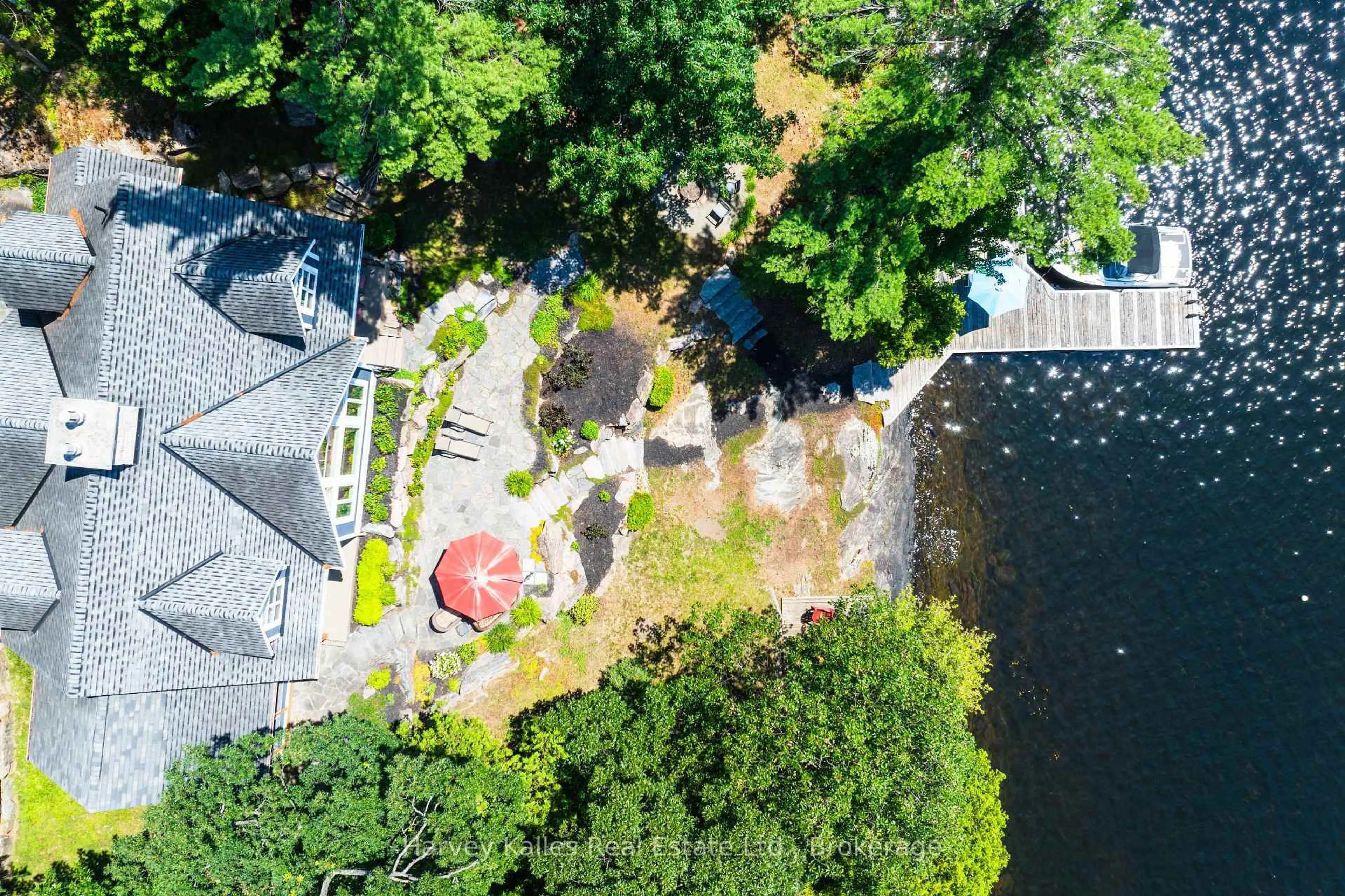A pic from outside/outdoor area/front of a property/back of a property/a pic from drone, water/lake/river/ocean view for 1190 Parkers Point Rd, Gravenhurst Ontario P1P 1R2