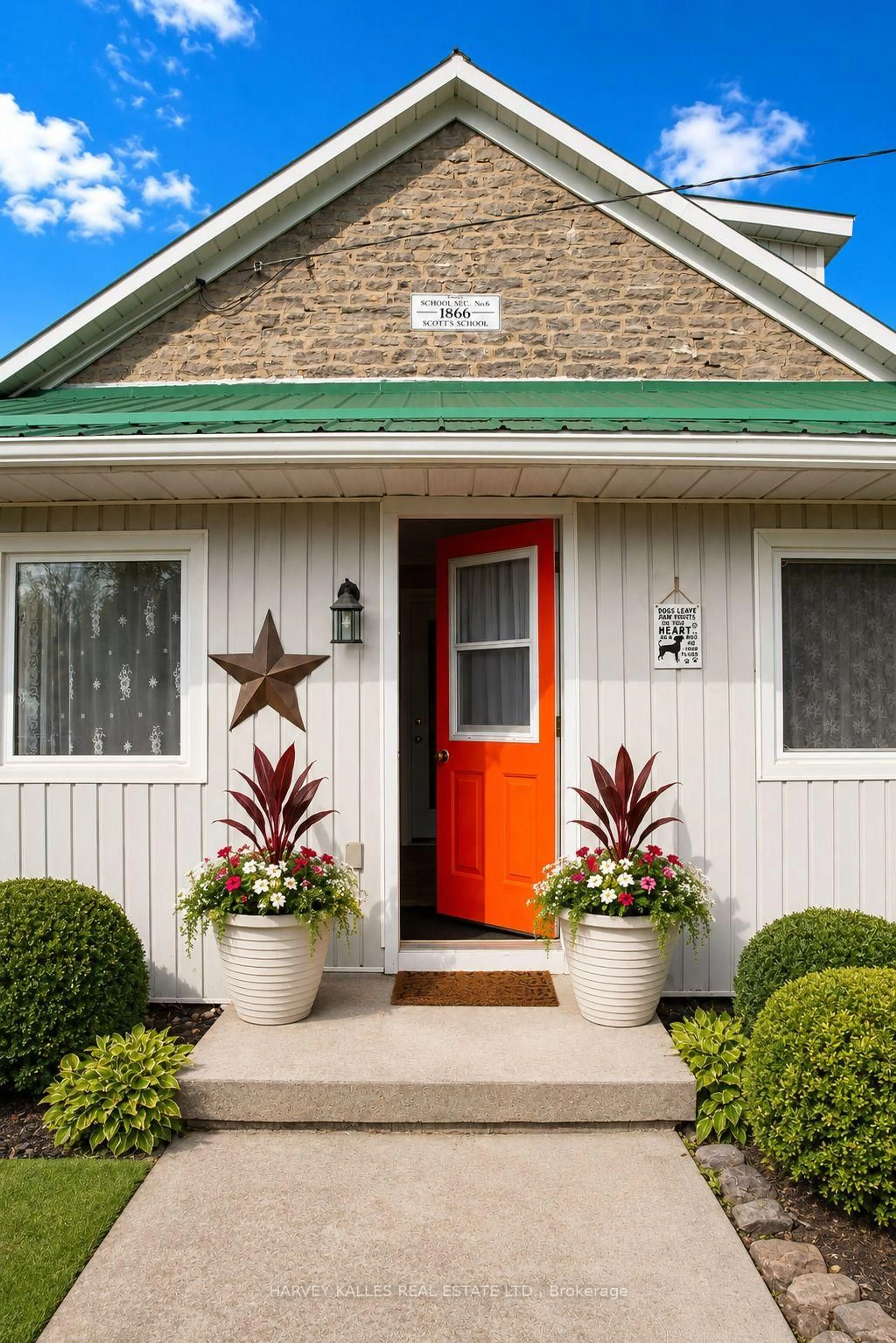 Home with vinyl exterior material, street for 8 School House Rd, Prince Edward County Ontario K0K 2P0