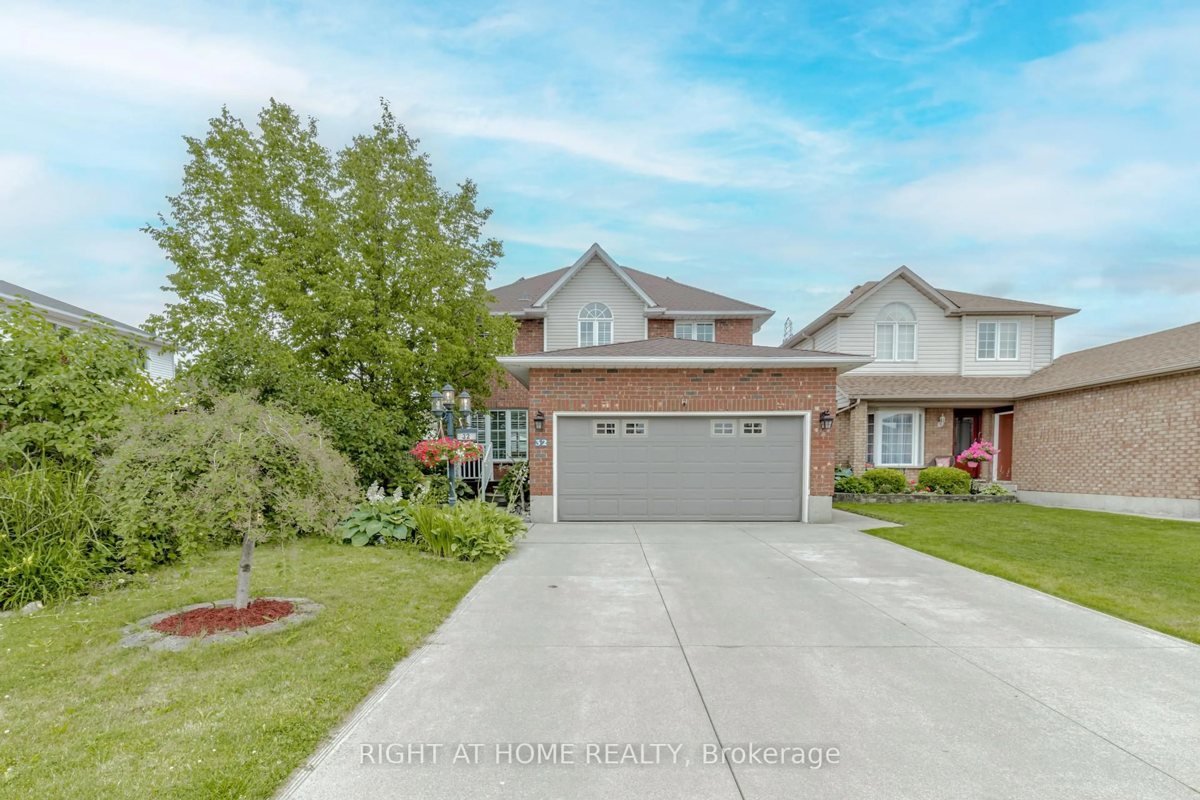 Home with brick exterior material, street for 32 Vineberg Dr, Hamilton Ontario L9B 2P6