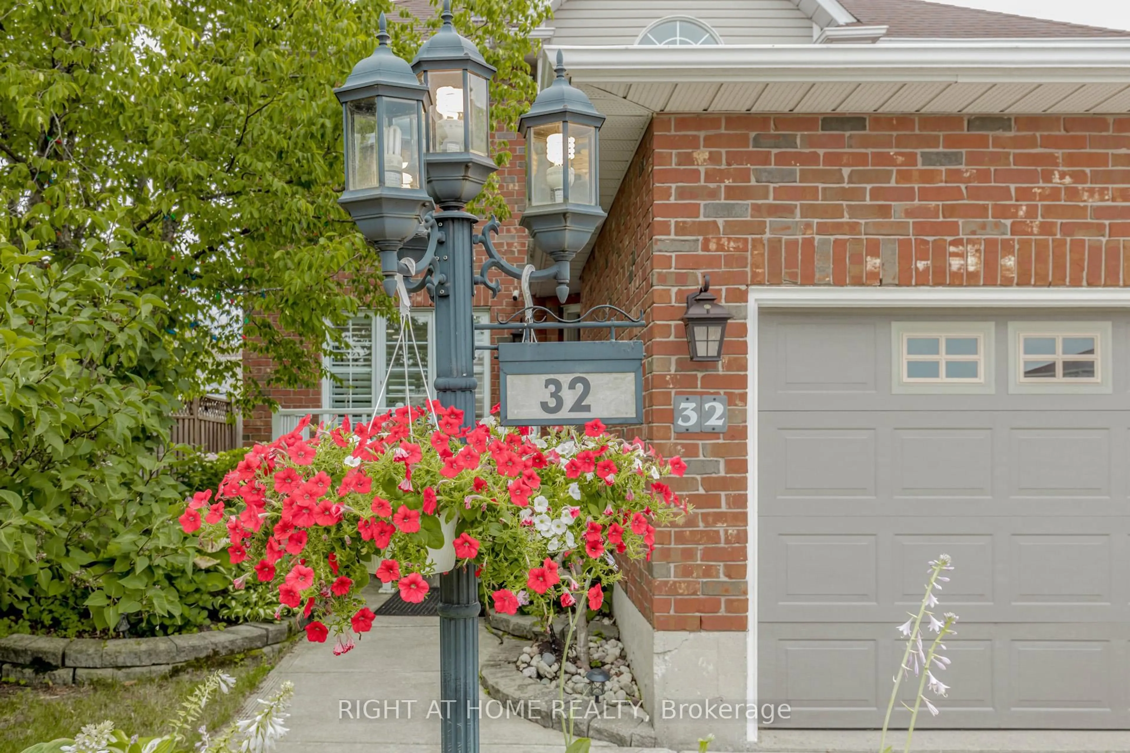 Home with brick exterior material, street for 32 Vineberg Dr, Hamilton Ontario L9B 2P6