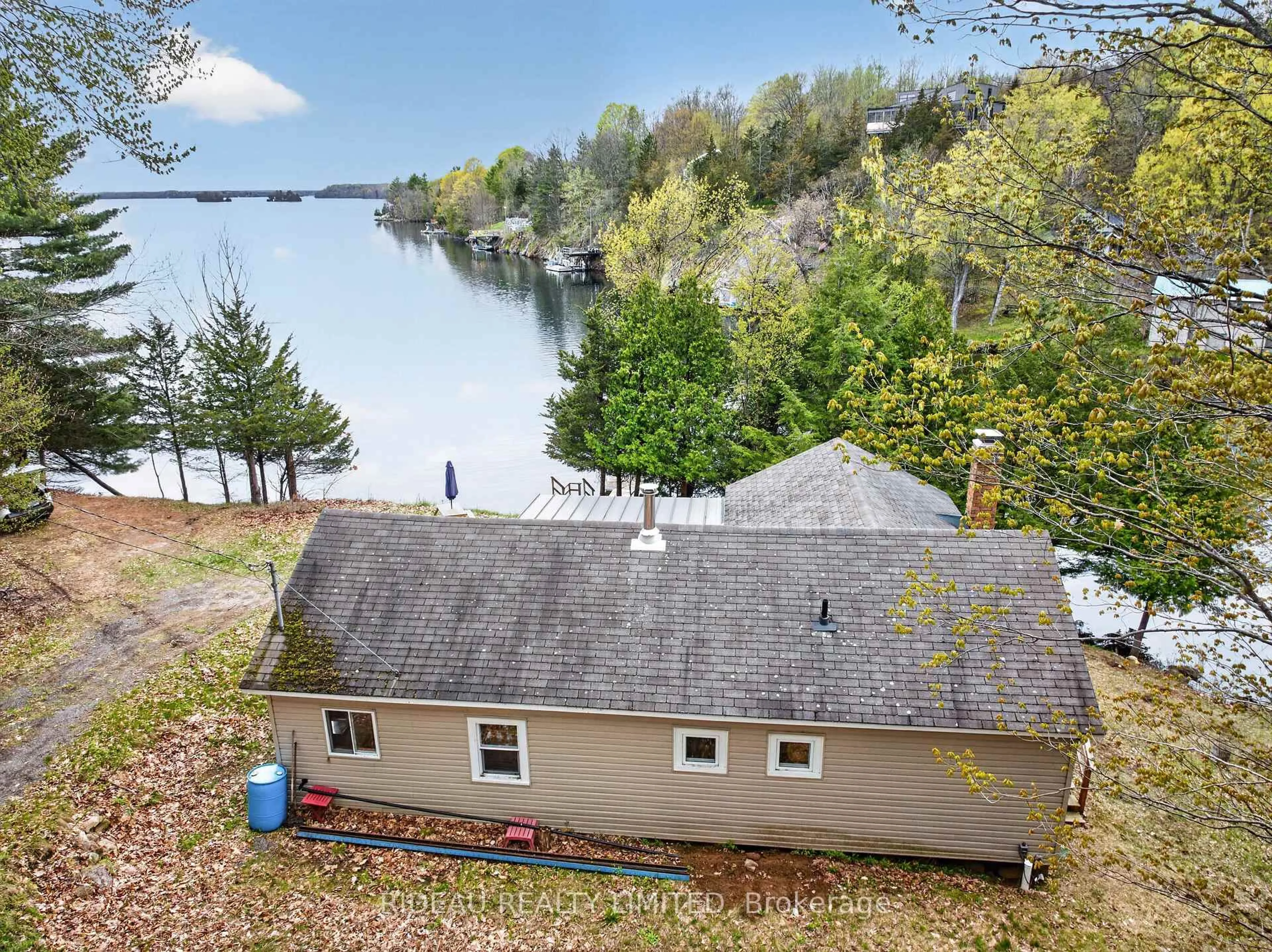 A pic from outside/outdoor area/front of a property/back of a property/a pic from drone, water/lake/river/ocean view for 9 Sparrow Lane, Rideau Lakes Ontario K0G 1V0