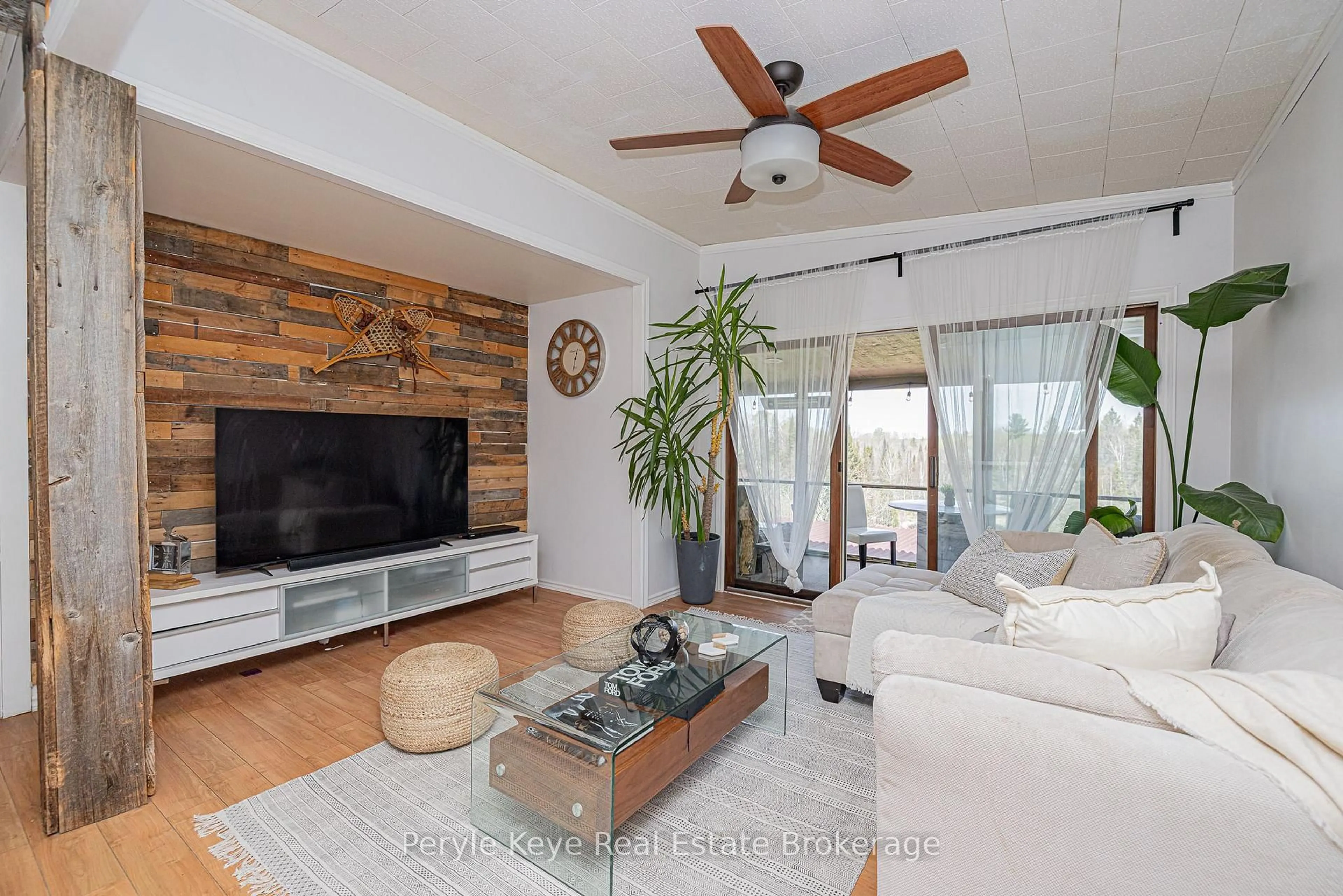 Living room with furniture, wood/laminate floor for 114 Robbs Rock Rd, Armour Ontario P0A 1C0