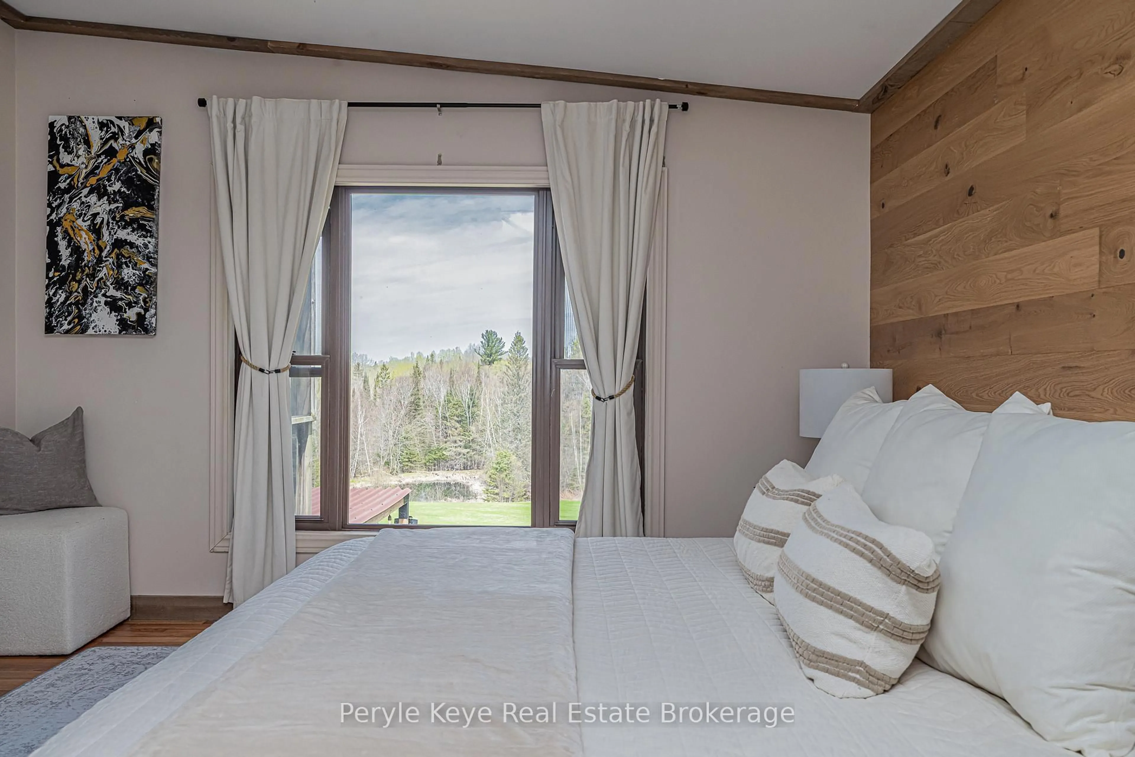 Bedroom with bed, wood/laminate floor for 114 Robbs Rock Rd, Armour Ontario P0A 1C0