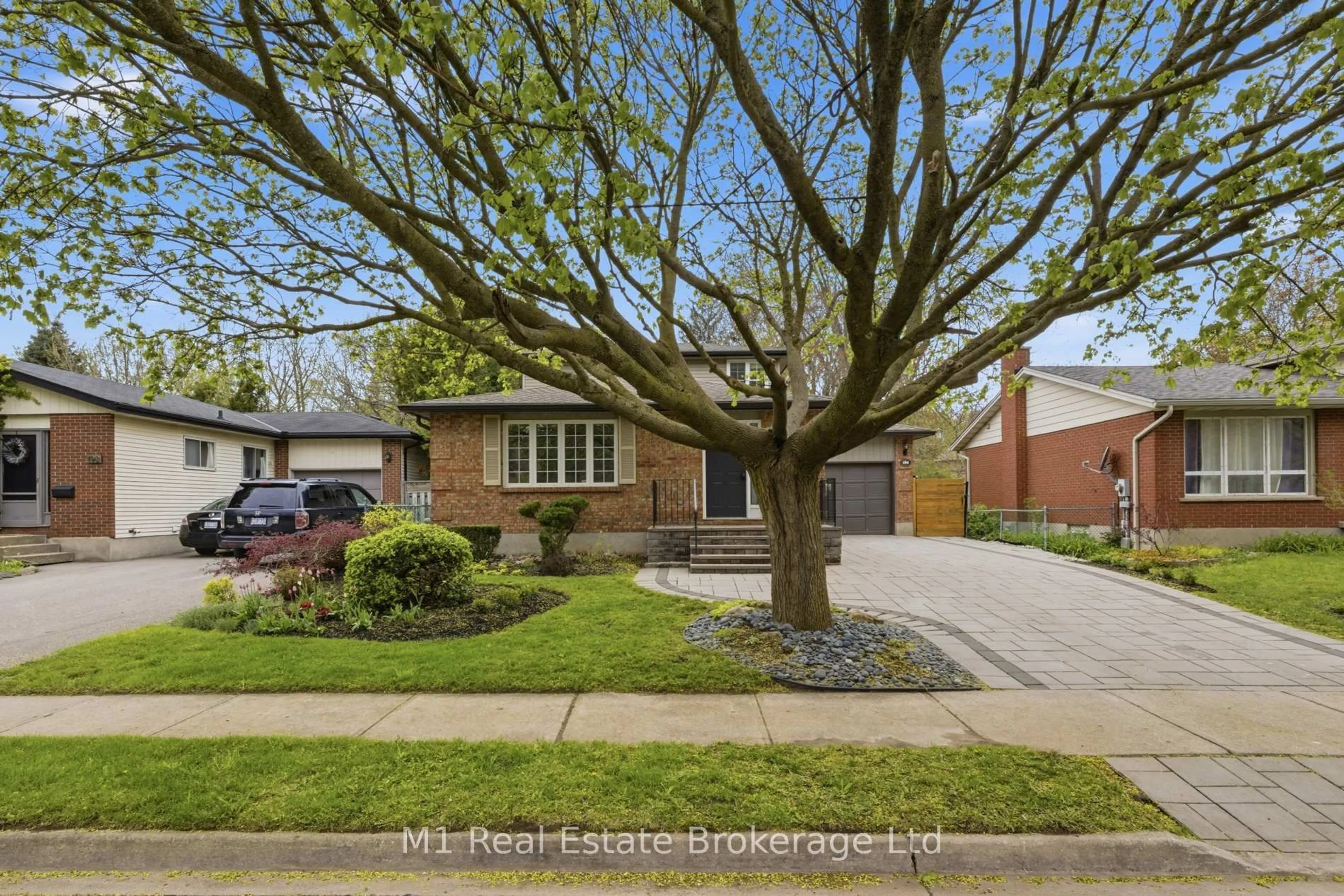 Home with brick exterior material, street for 194 Cardigan St, Guelph Ontario N1H 3Z9