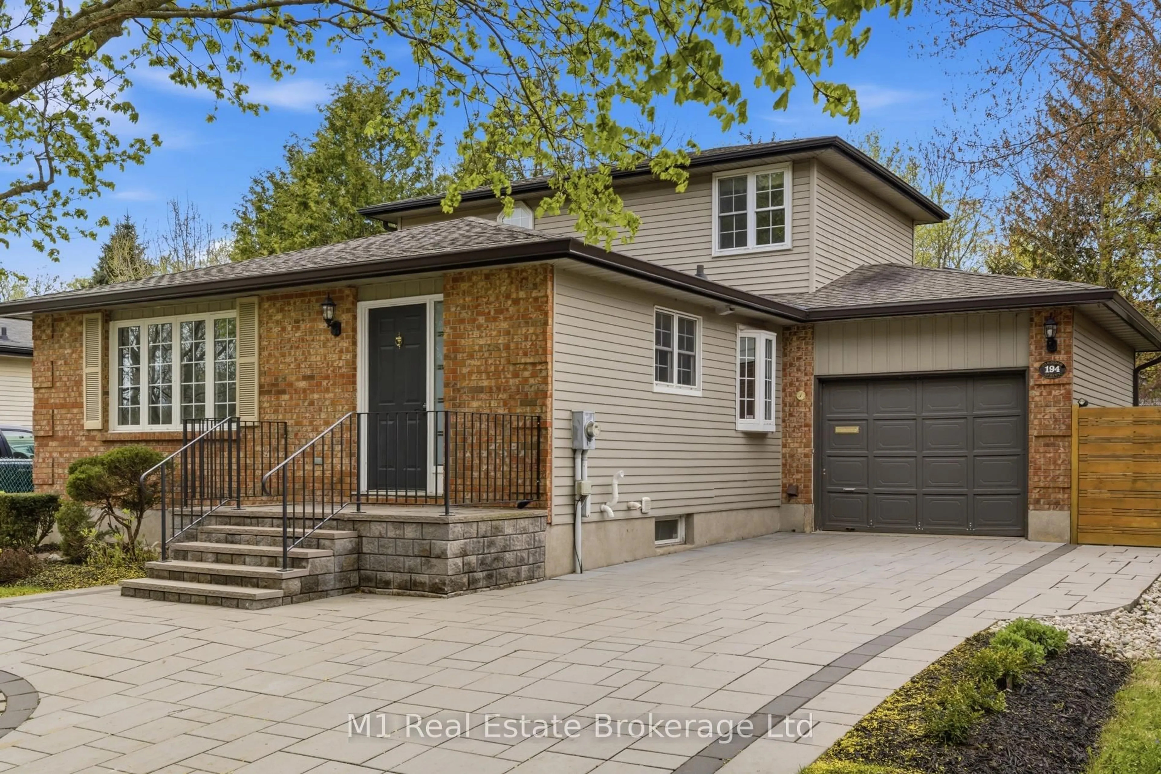 Home with brick exterior material, street for 194 Cardigan St, Guelph Ontario N1H 3Z9