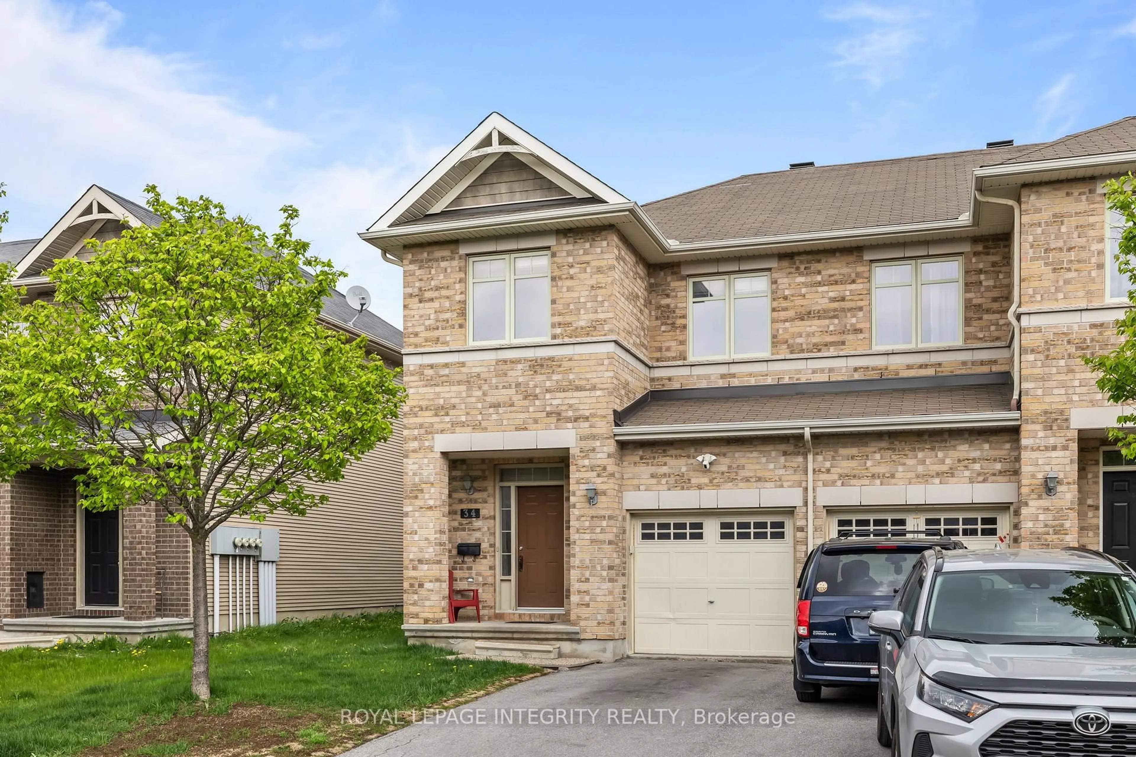 Home with brick exterior material, street for 34 Torbec Ave, Ottawa Ontario K2T 0B6