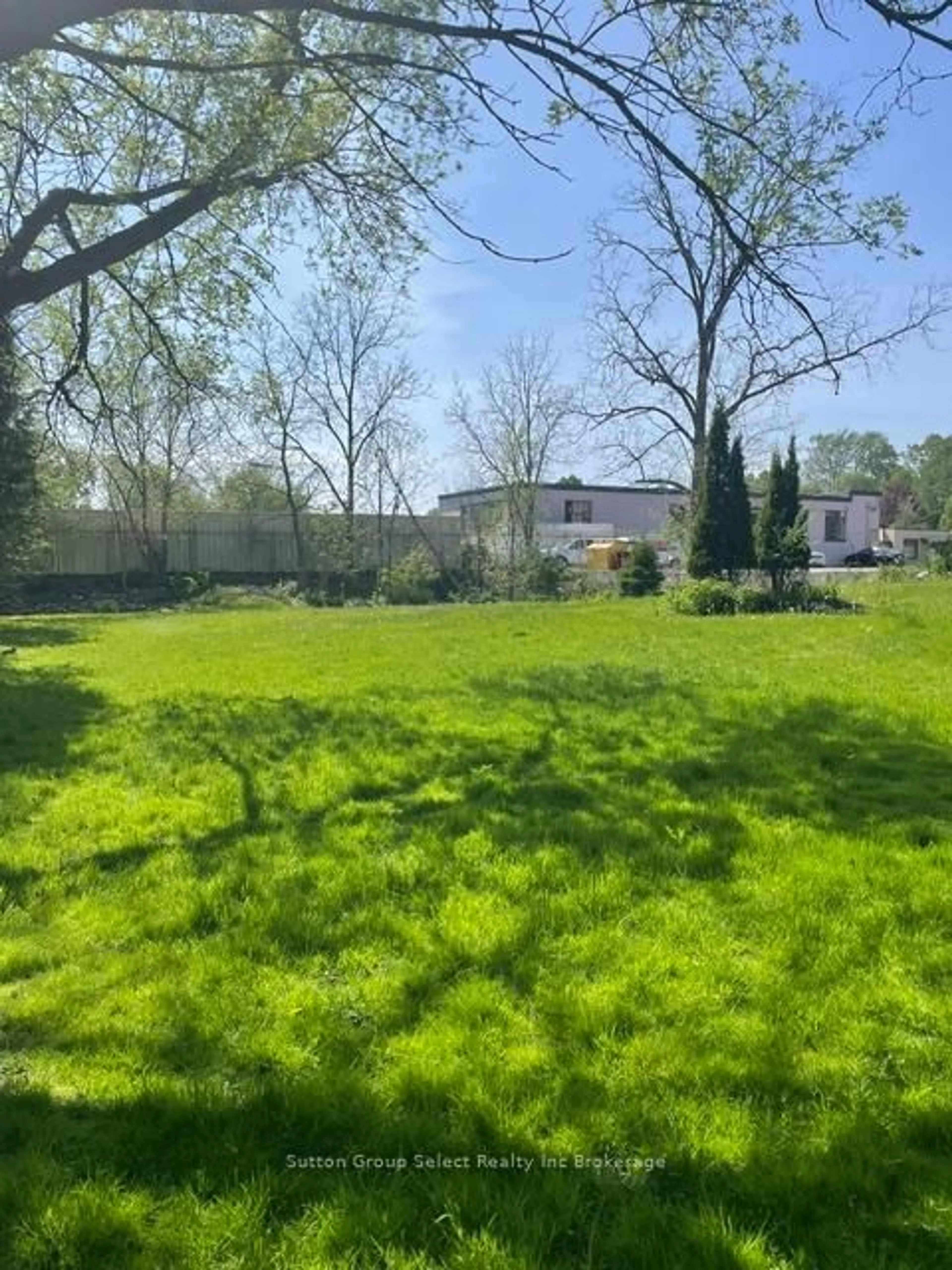 A pic from outside/outdoor area/front of a property/back of a property/a pic from drone, forest/trees view for 9 Waterloo St, Woodstock Ontario N4S 2S9