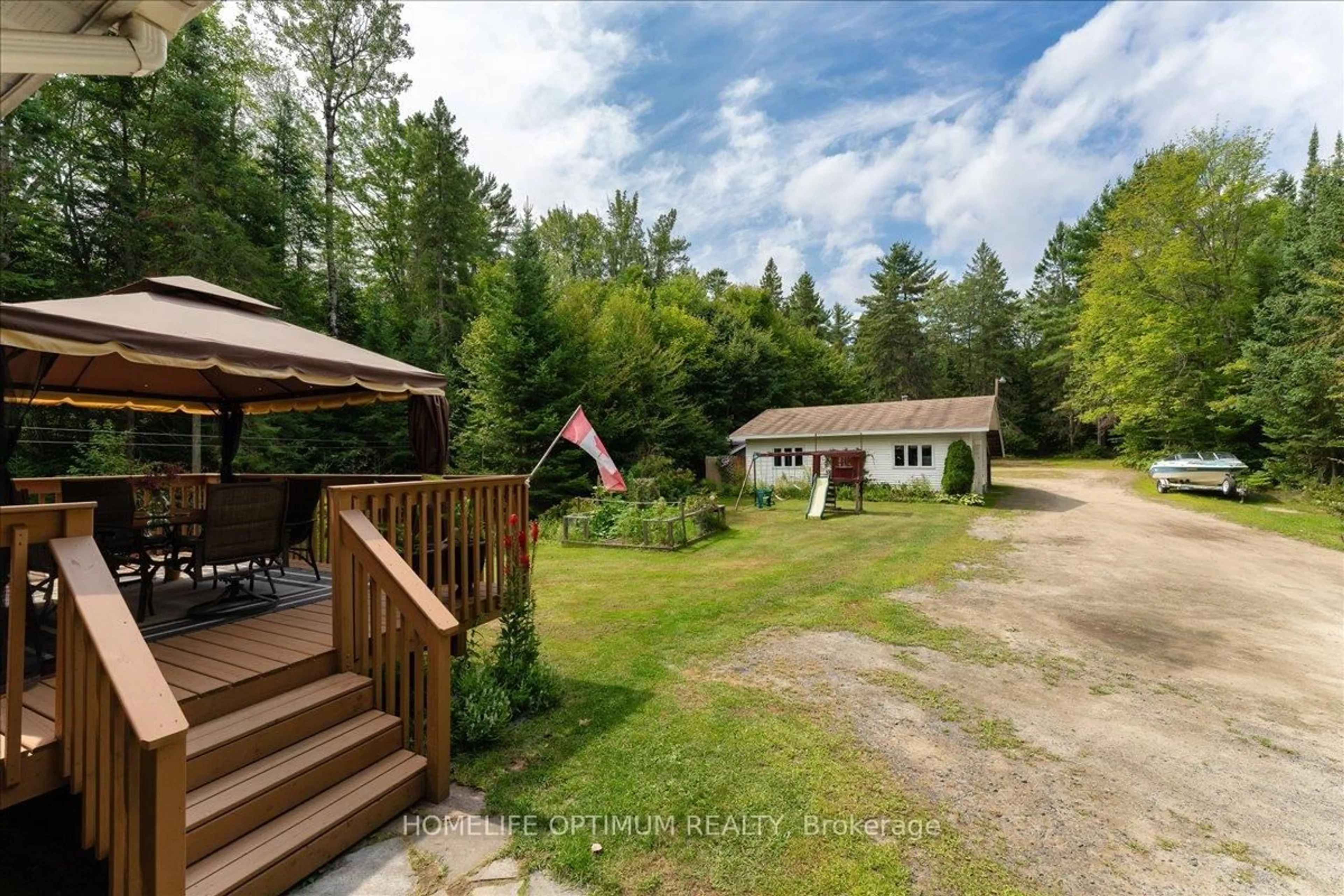 A pic from outside/outdoor area/front of a property/back of a property/a pic from drone, forest/trees view for 788 Muskoka Rd 3 Rd, Huntsville Ontario P1H 1E1