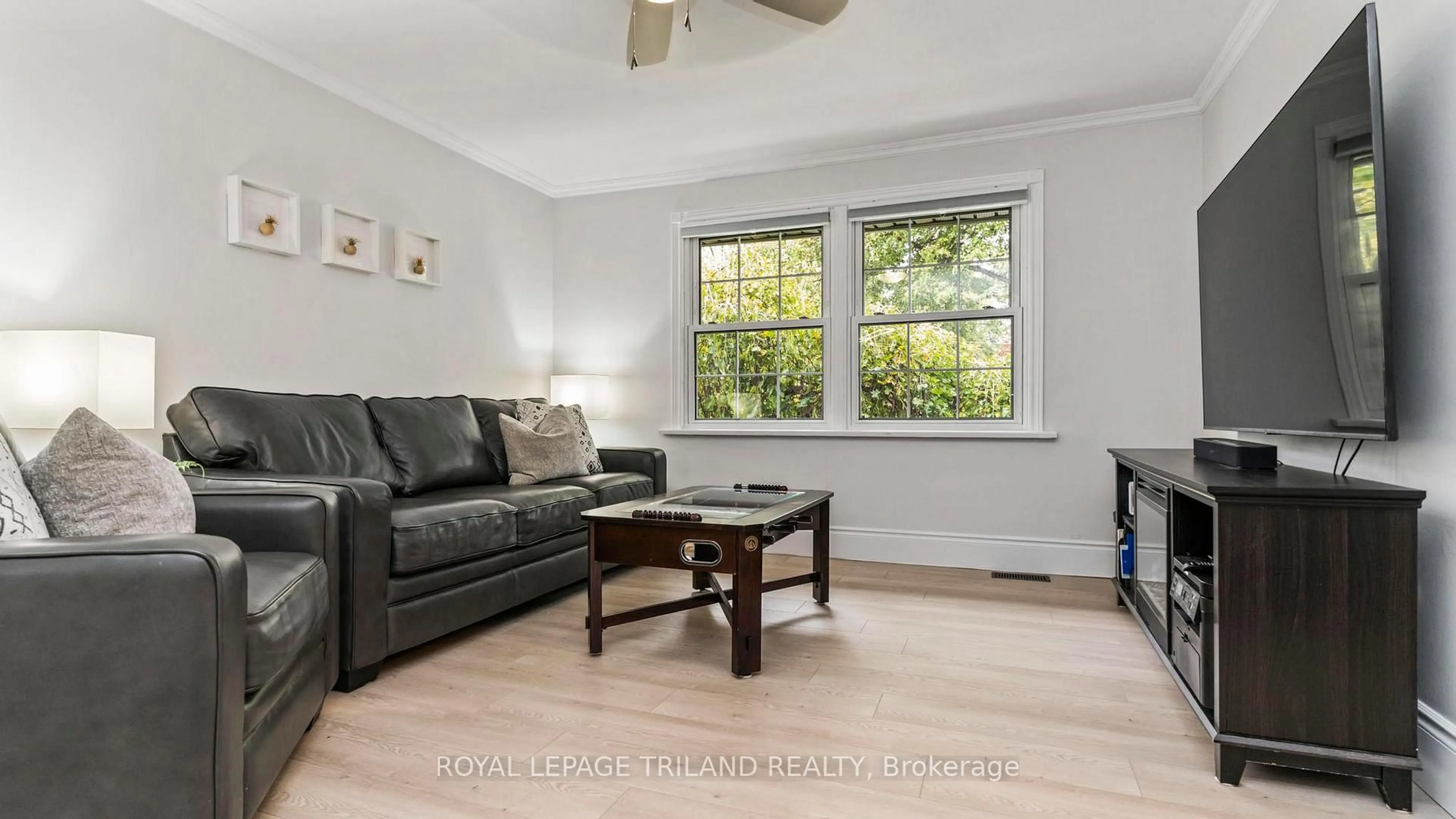 Living room with furniture, wood/laminate floor for 1598 Nairn Ave, London East Ontario N5V 2P2