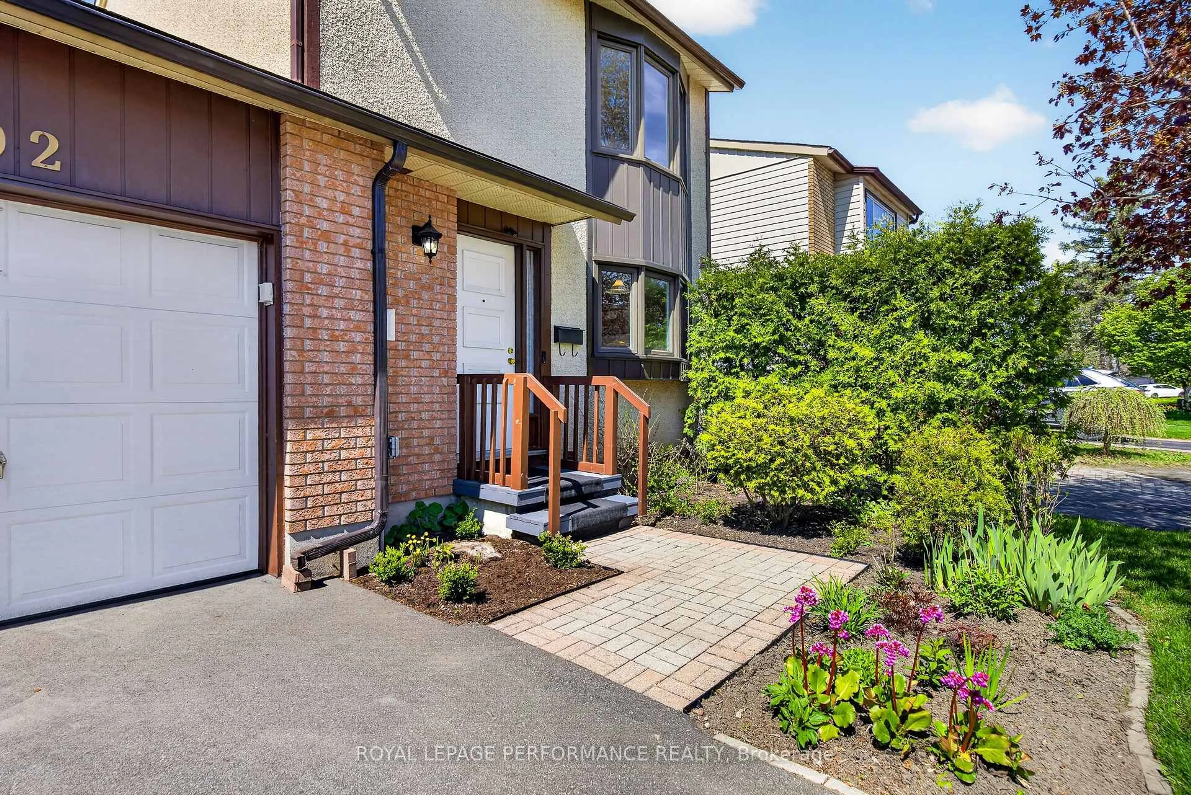 Home with brick exterior material, street for 402 Duval Lane, Orleans Ontario K1E 2K2