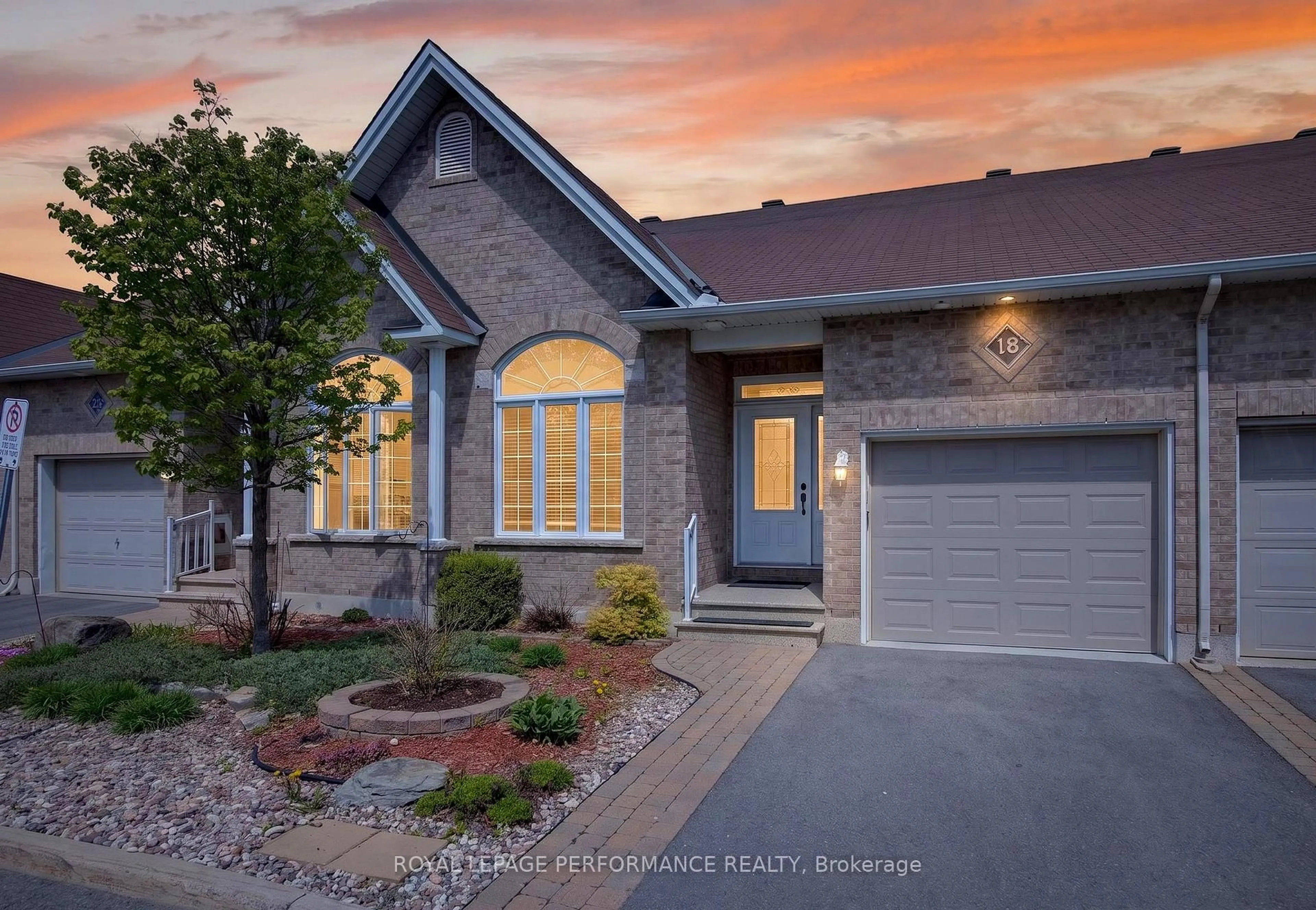 Home with brick exterior material, street for 18 Chapelier Private, Orleans Ontario K1E 3Y1