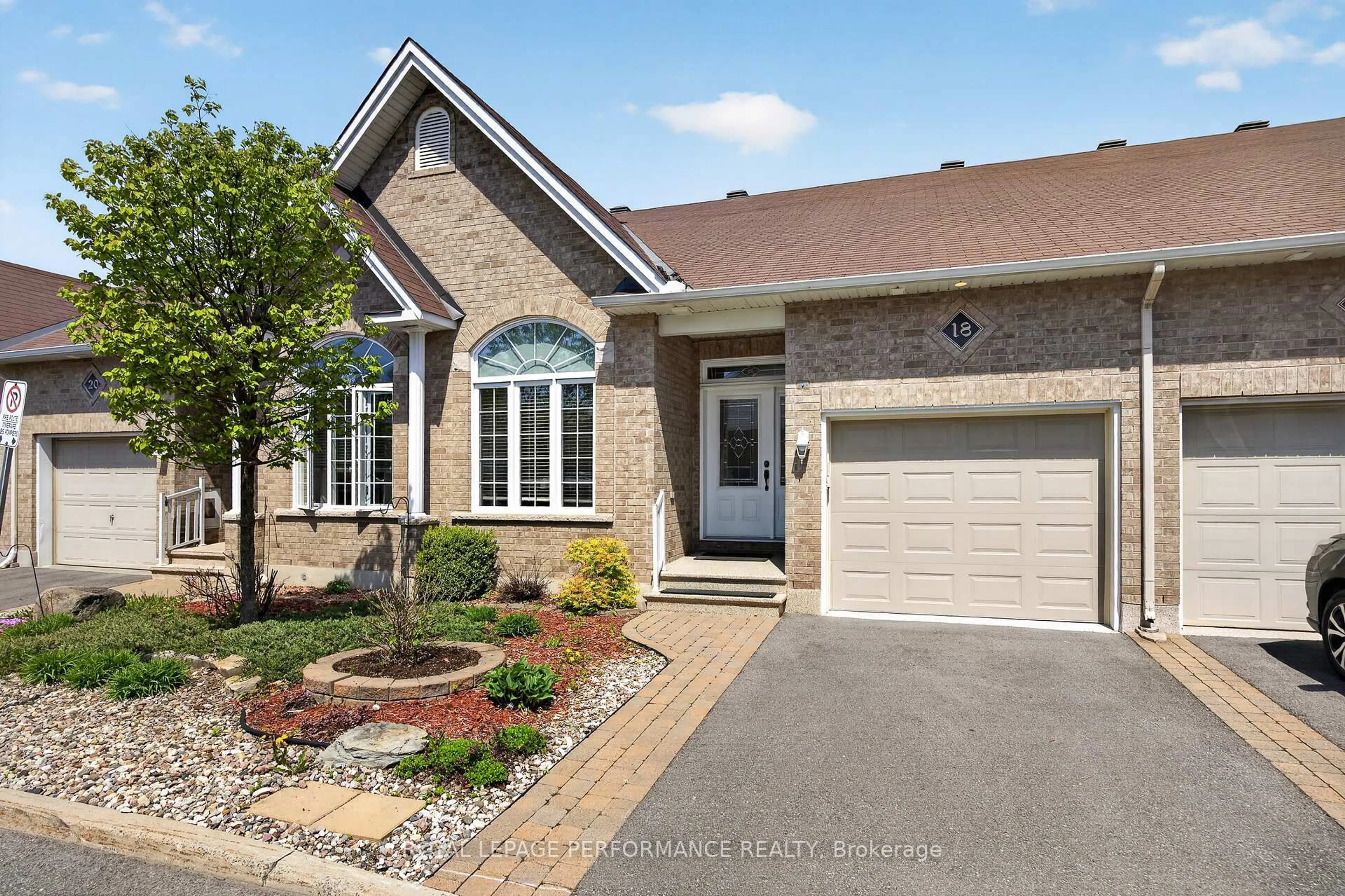 Home with brick exterior material, street for 18 Chapelier Private, Orleans Ontario K1E 3Y1