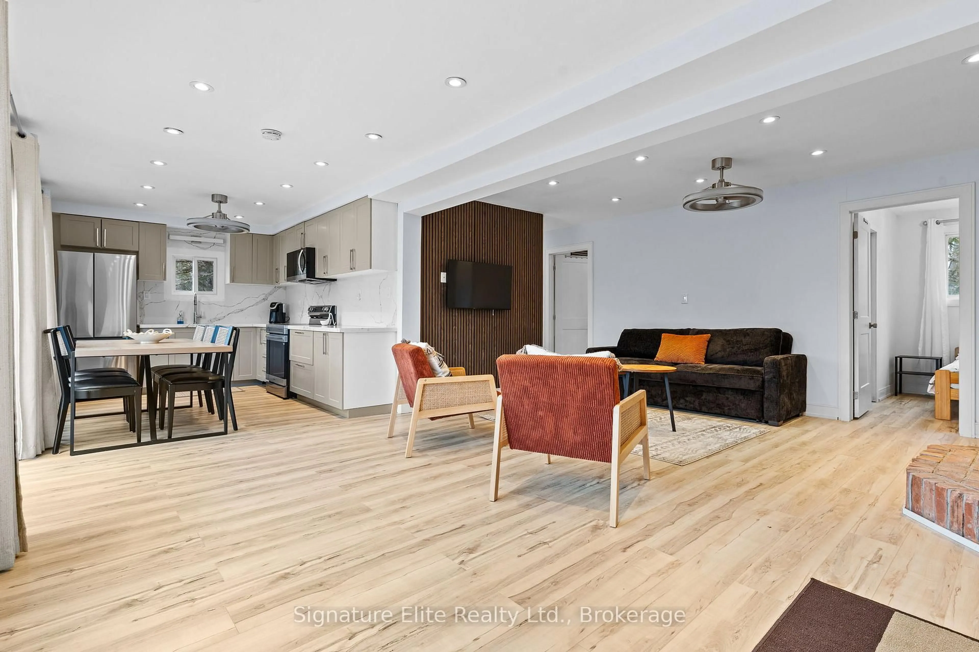 Open concept kitchen, wood/laminate floor for 1077 Nystedt Lane, Minden Hills Ontario K0M 2A1
