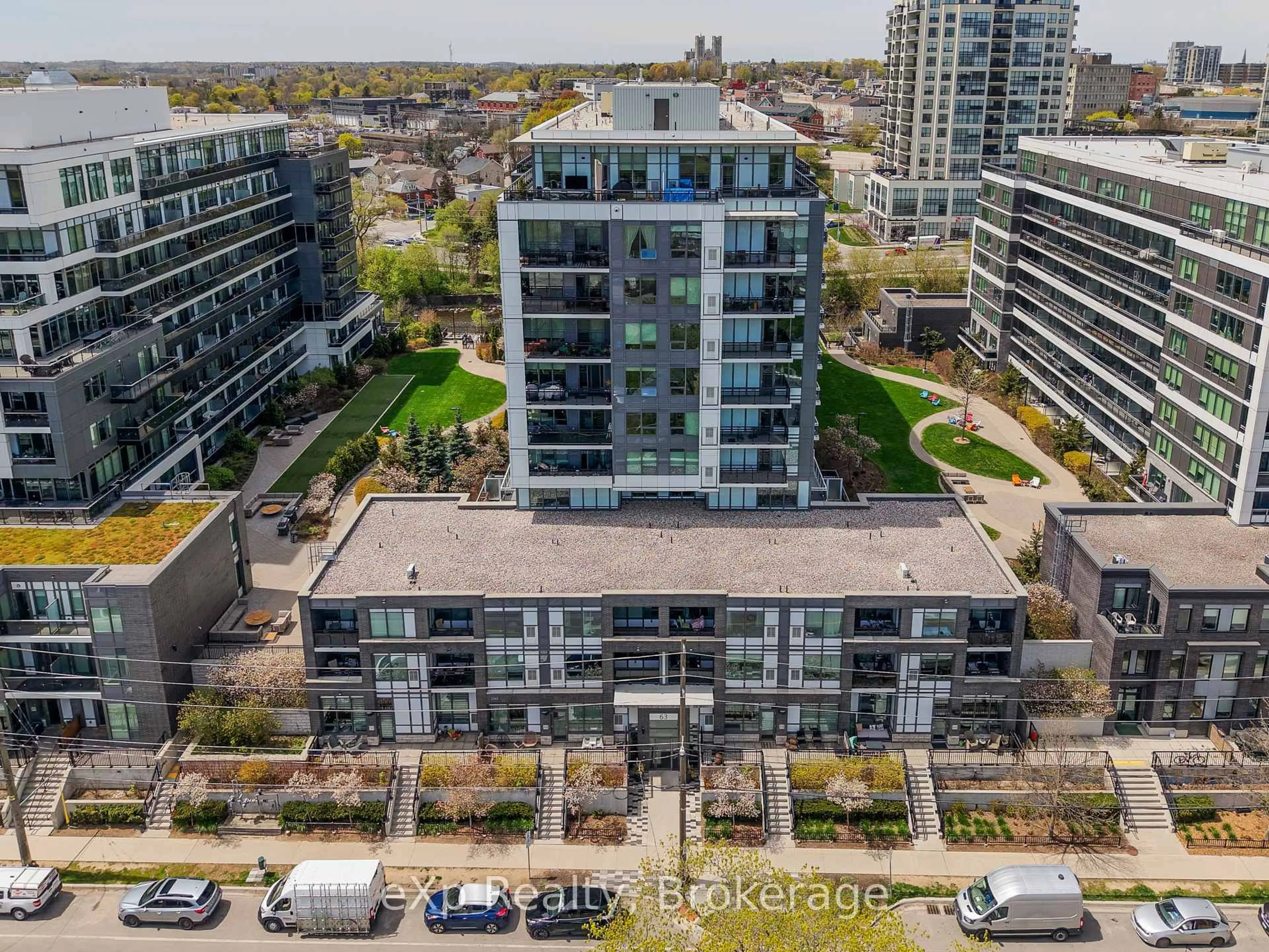 A pic from outside/outdoor area/front of a property/back of a property/a pic from drone, city buildings view from balcony for 63 Arthur St #205, Guelph Ontario N1E 0A8