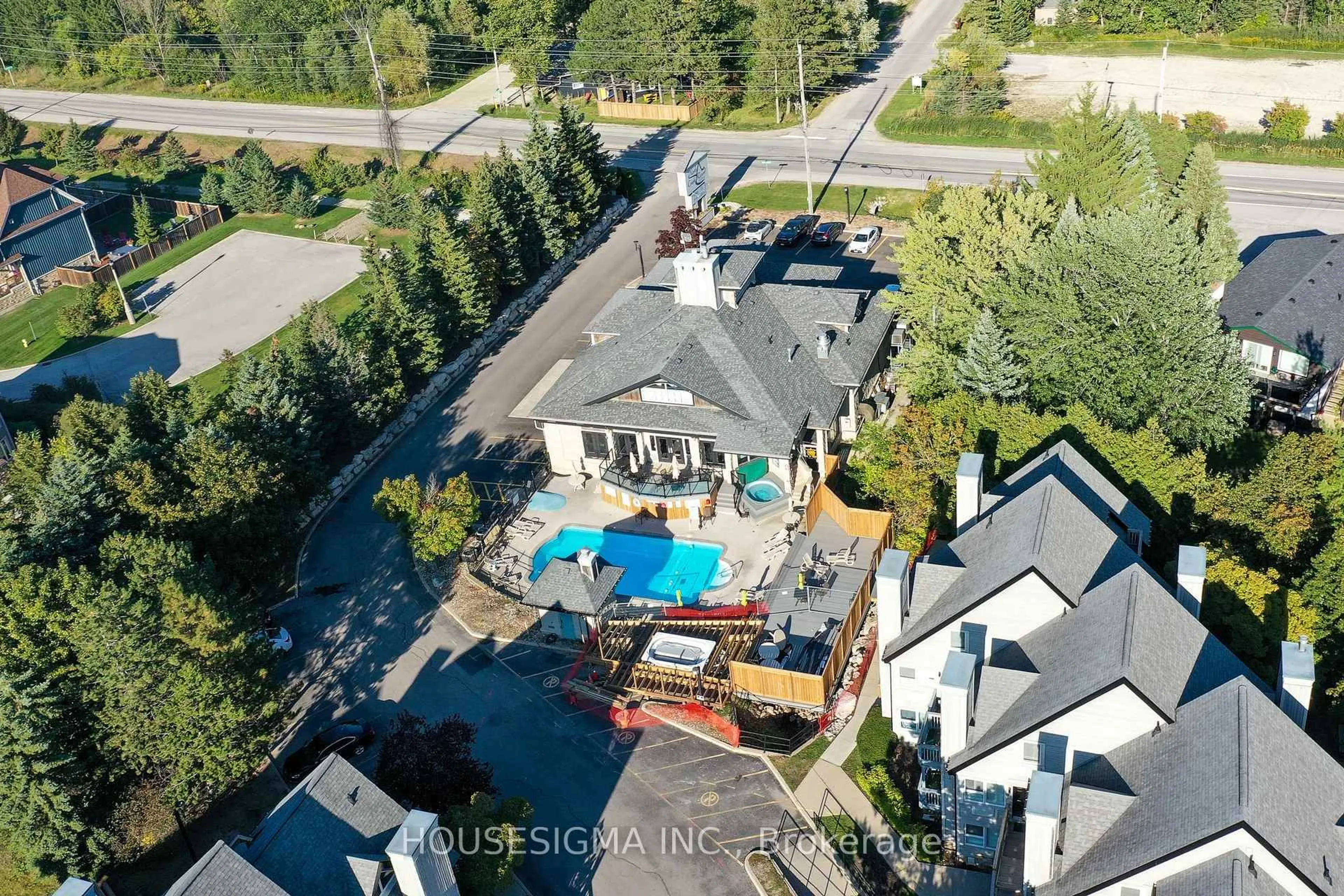 A pic from outside/outdoor area/front of a property/back of a property/a pic from drone, unknown for 796468 Grey 19 Rd #407, Blue Mountains Ontario L9Y 0N6