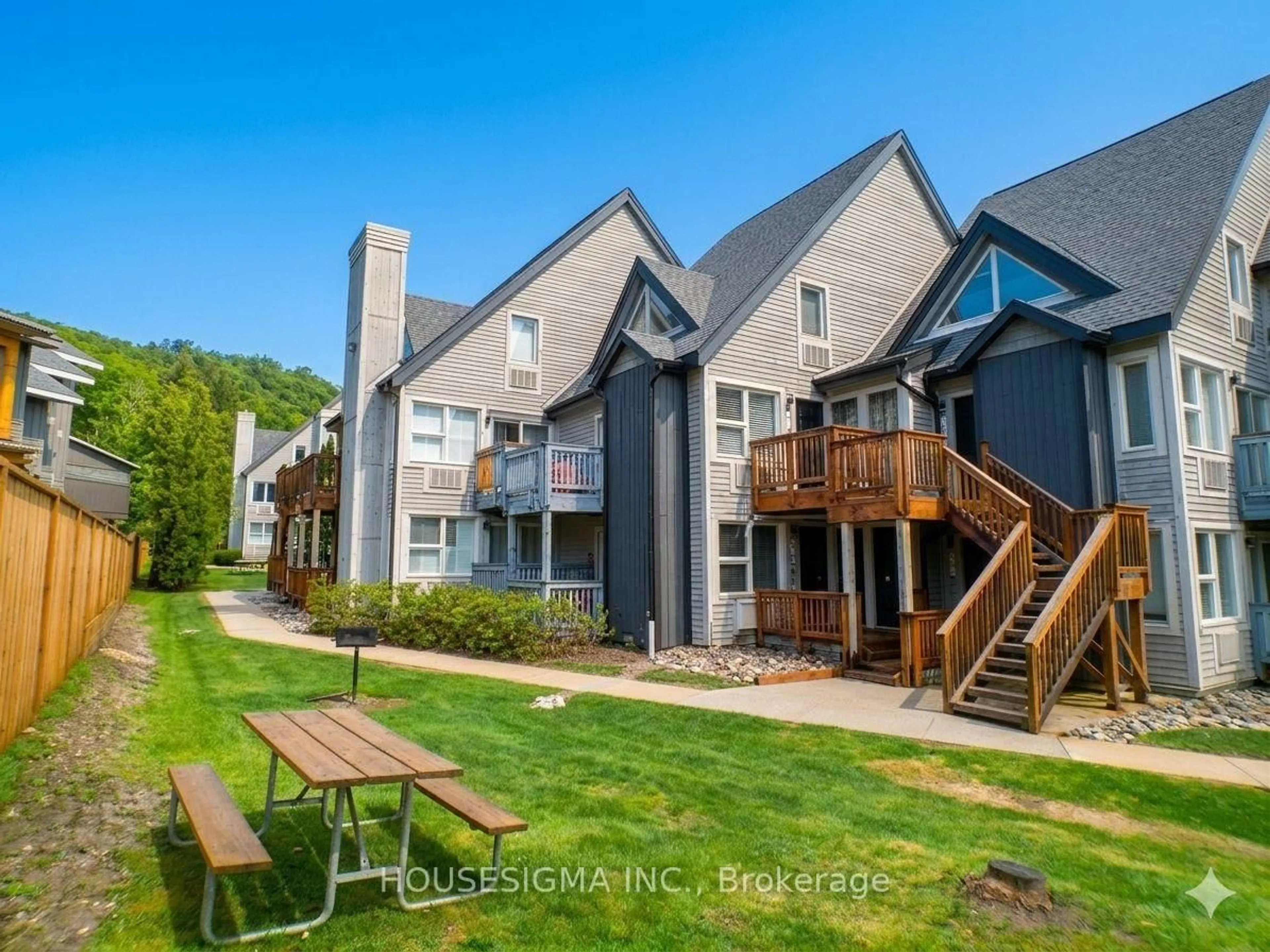 A pic from outside/outdoor area/front of a property/back of a property/a pic from drone, mountain view for 796468 Grey 19 Rd #407, Blue Mountains Ontario L9Y 0N6