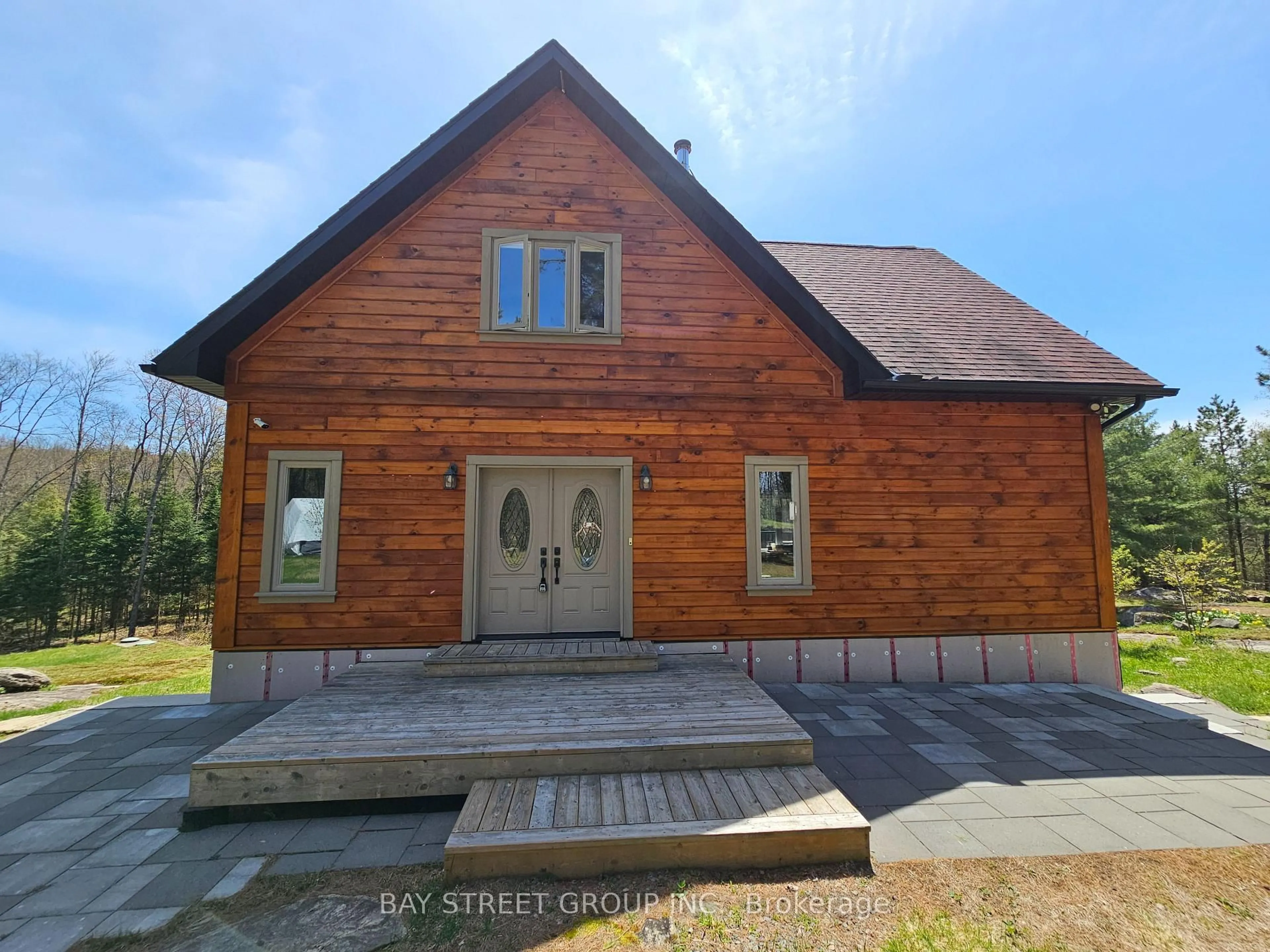Home with brick exterior material, street for 1032 Spring Lake Rd, Bracebridge Ontario P1L 1X1