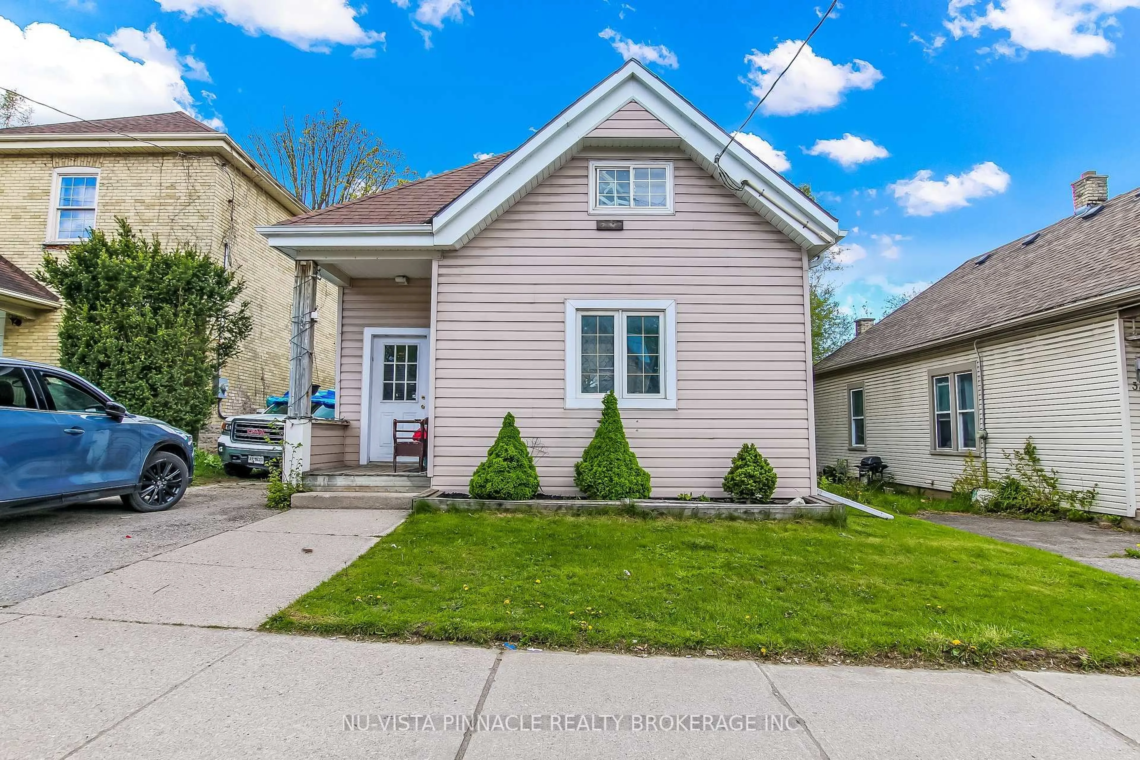 Home with vinyl exterior material, street for 41 Adelaide St, London South Ontario N5Z 3K1