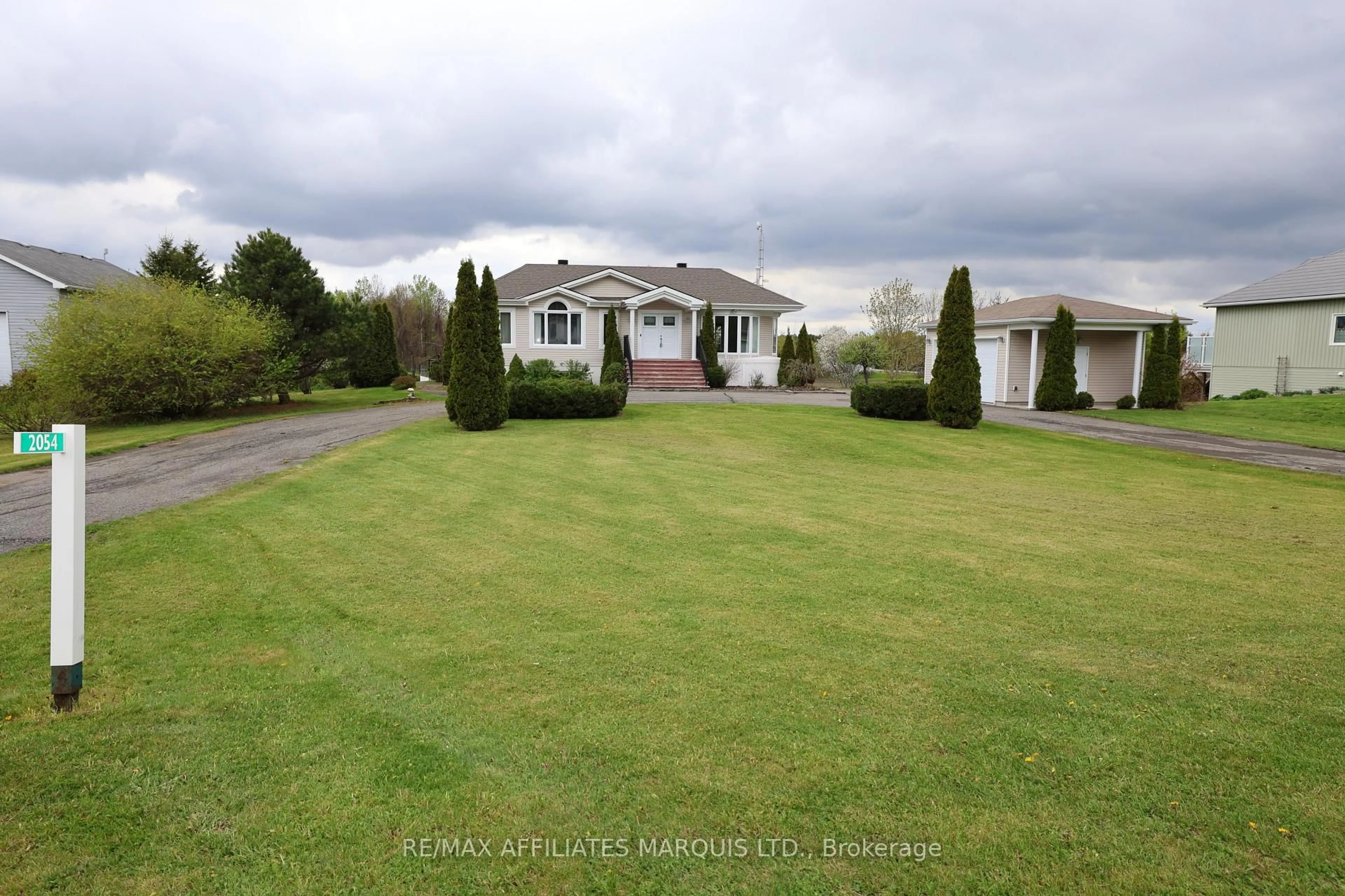 A pic from outside/outdoor area/front of a property/back of a property/a pic from drone, mountain view for 2054 Valley St, North Stormont Ontario K0C 1W0