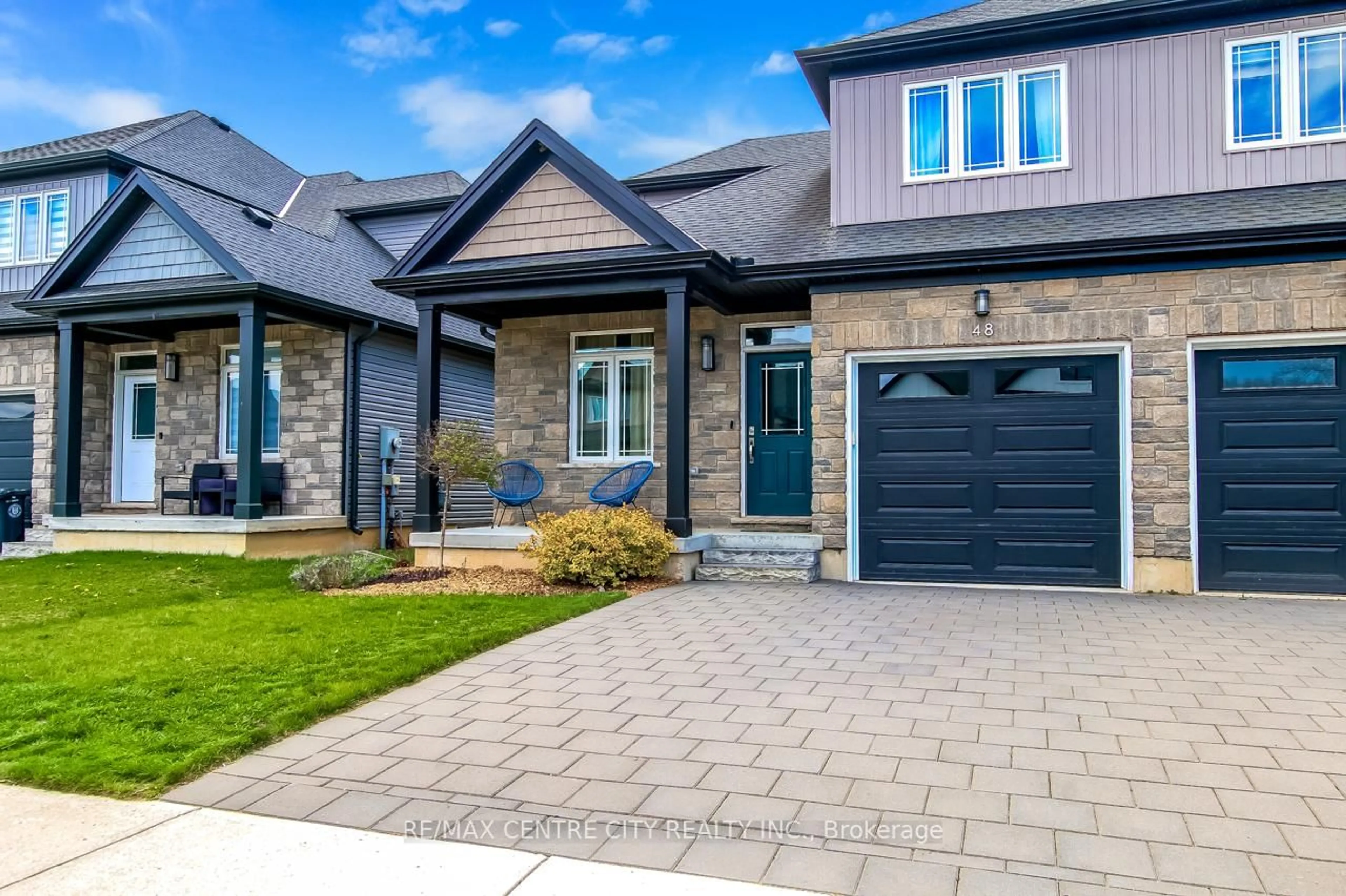 Home with brick exterior material, street for 48 Compass Tr, Central Elgin Ontario N5L 0B4