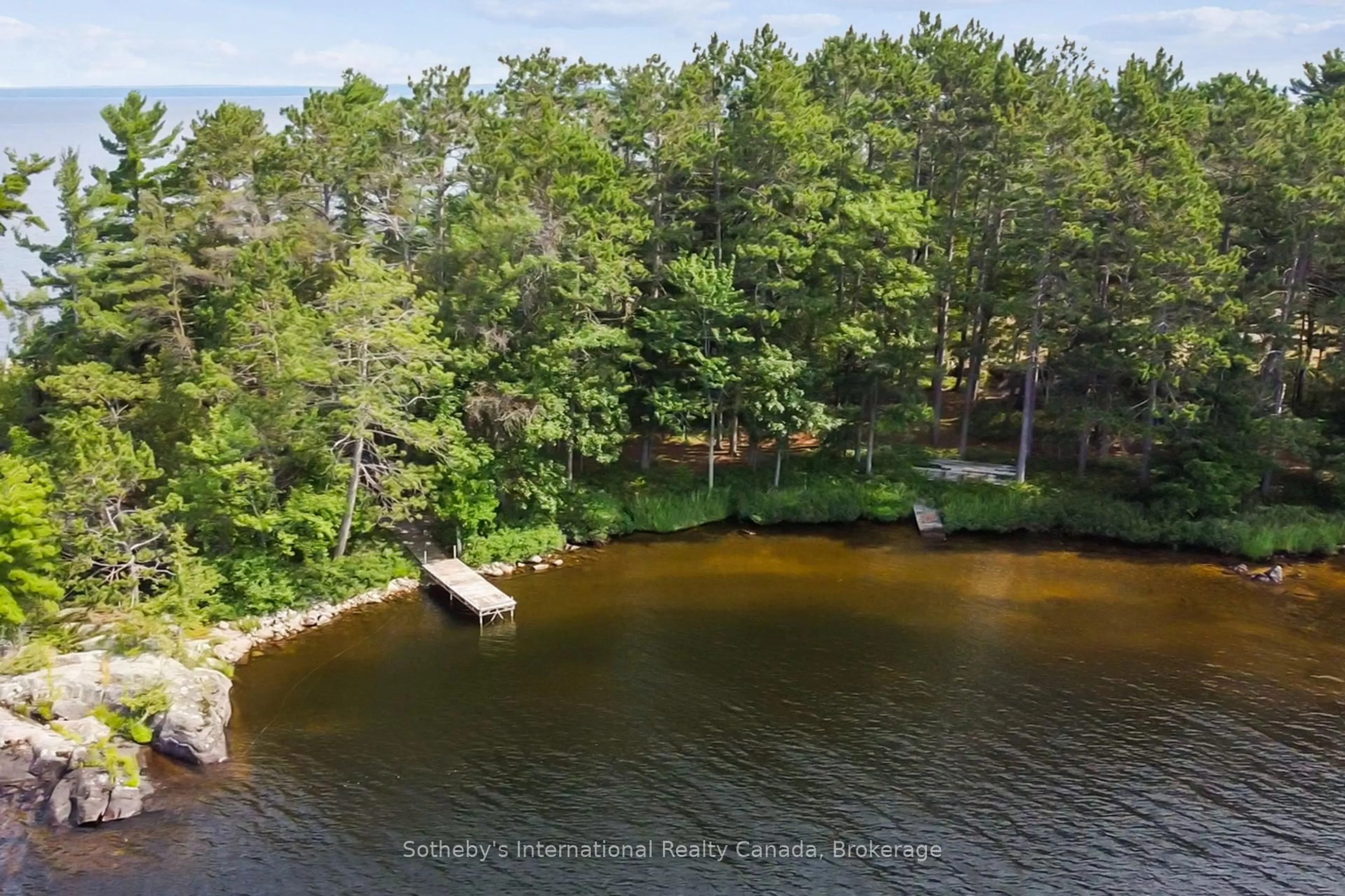 A pic from outside/outdoor area/front of a property/back of a property/a pic from drone, water/lake/river/ocean view for 1 BRILL'S ISLAND, Nipissing Ontario P0H 1H0
