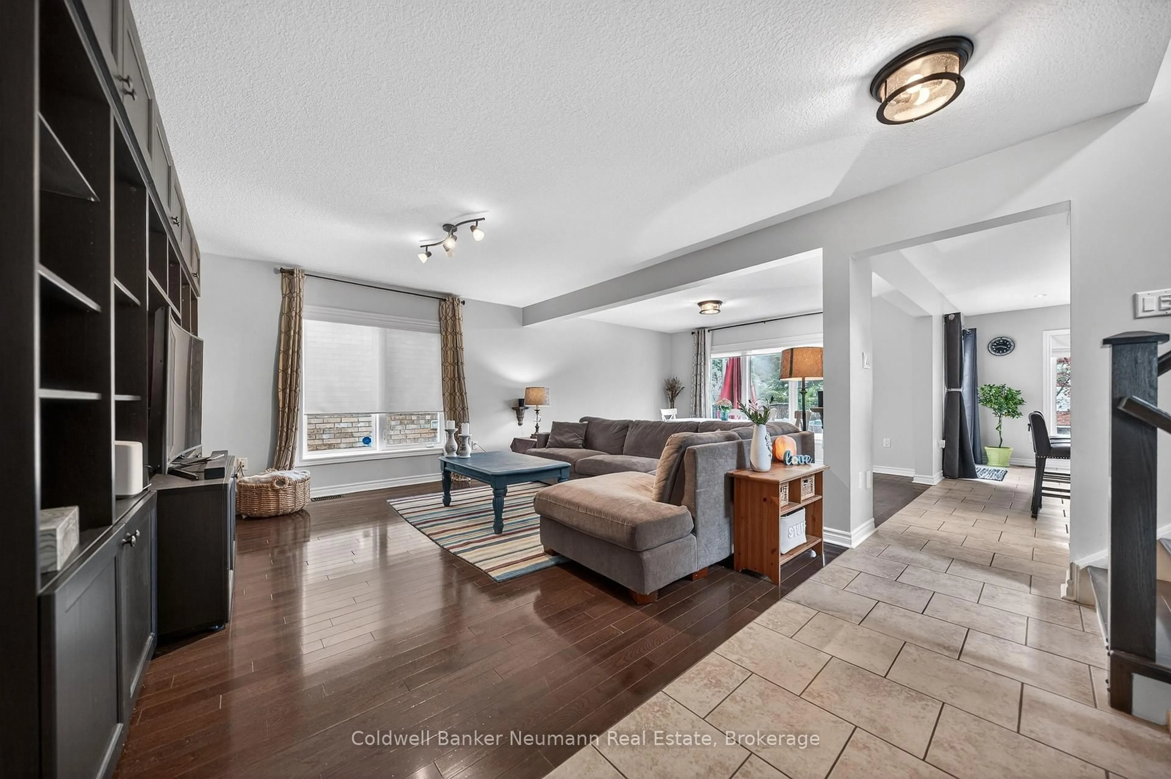 Living room with furniture, ceramic/tile floor for 184 Goodwin Dr, Guelph Ontario N1L 0C7