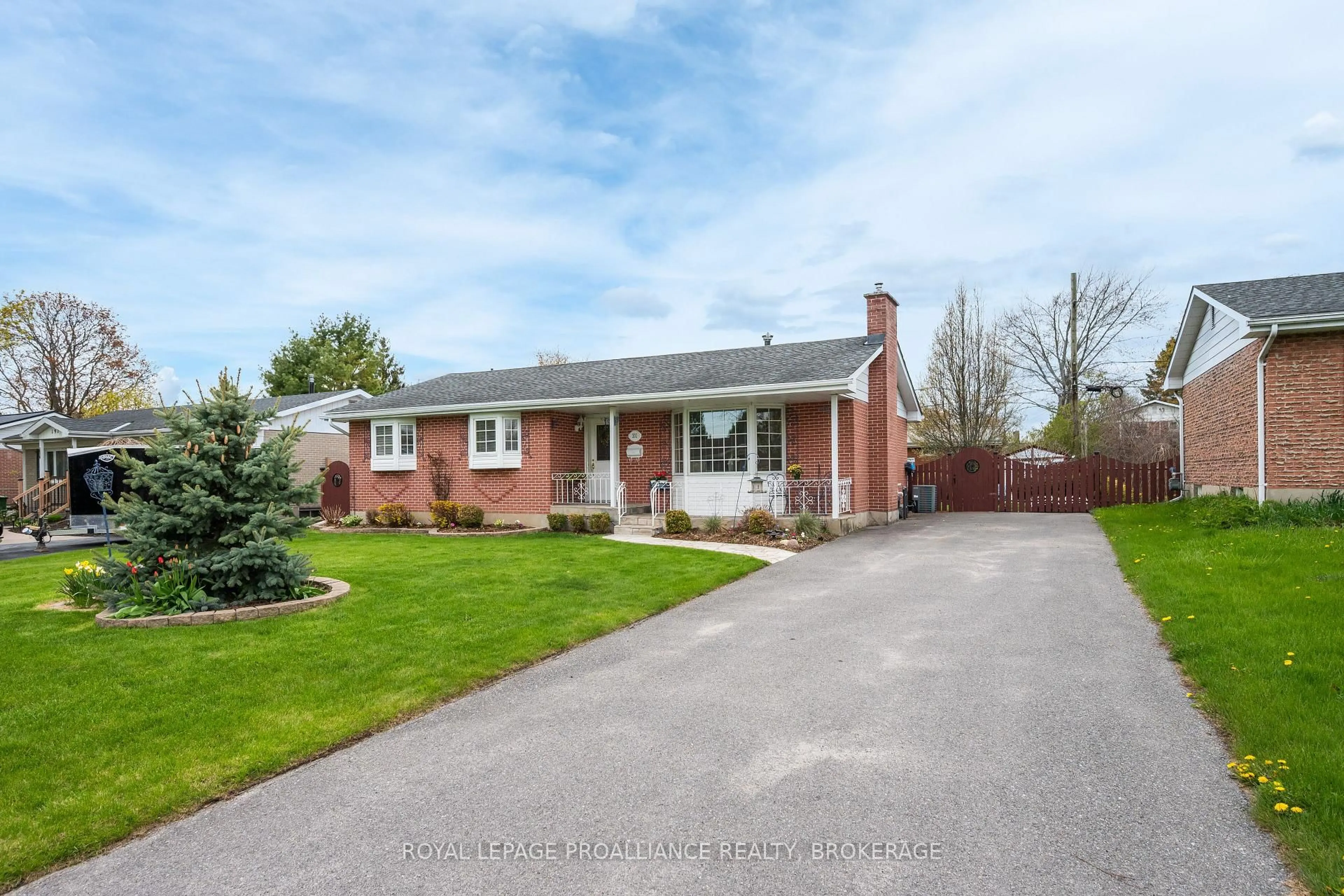 Home with brick exterior material, street for 201 Camberley Cres, Kingston Ontario K7M 4C5