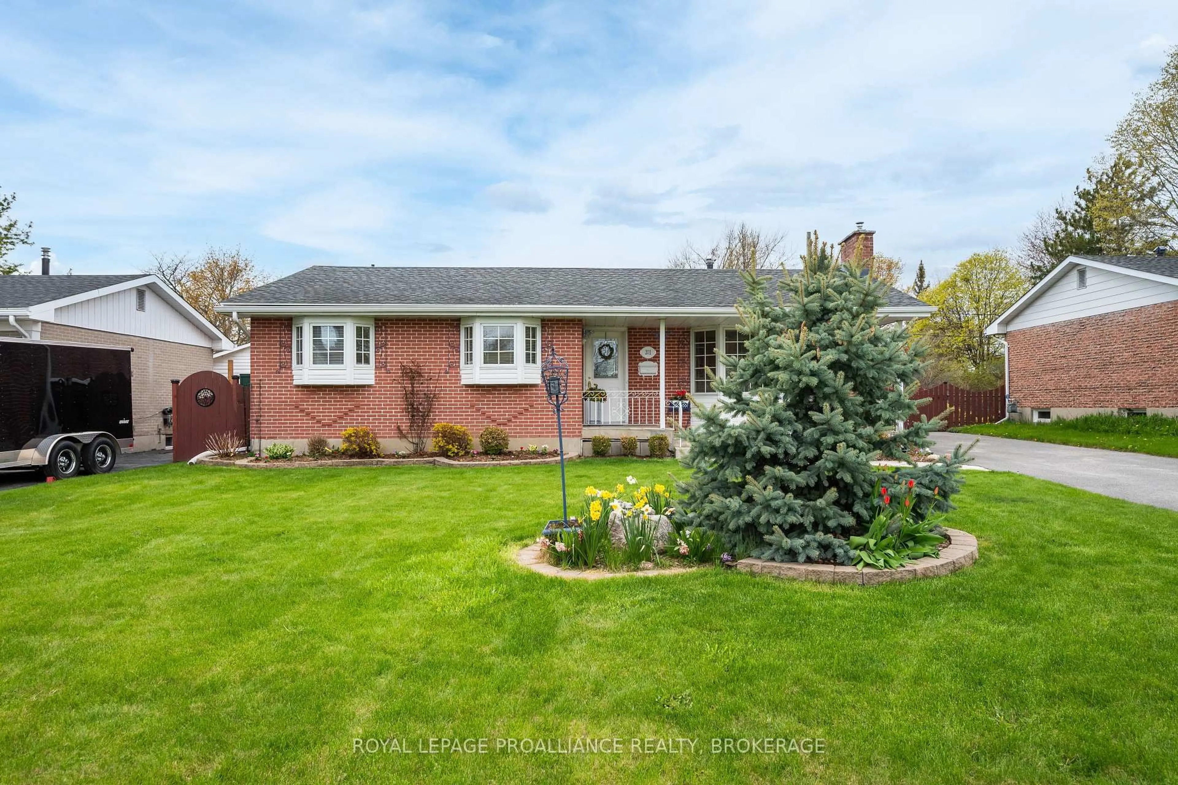 Home with brick exterior material, street for 201 Camberley Cres, Kingston Ontario K7M 4C5
