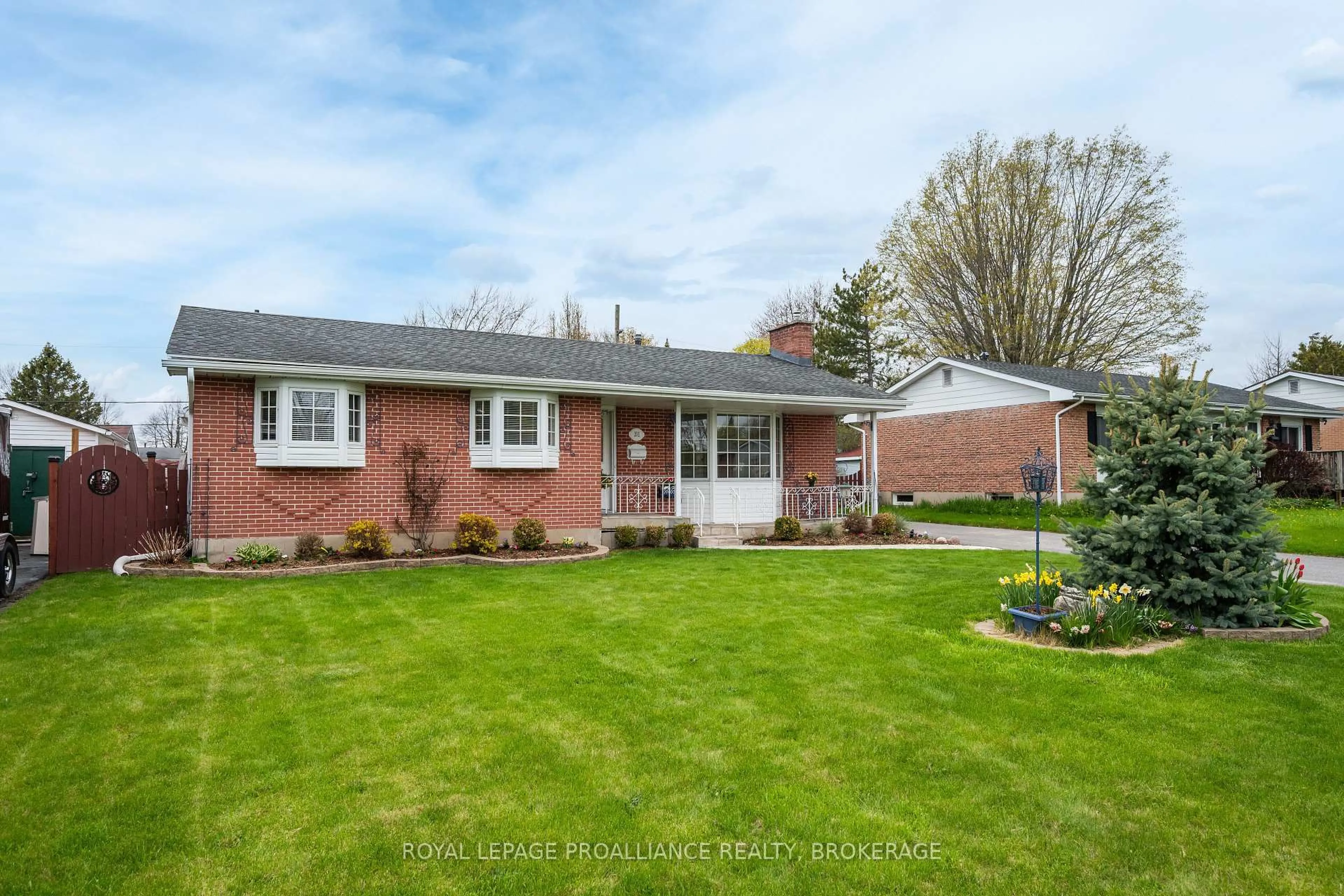 Home with brick exterior material, street for 201 Camberley Cres, Kingston Ontario K7M 4C5