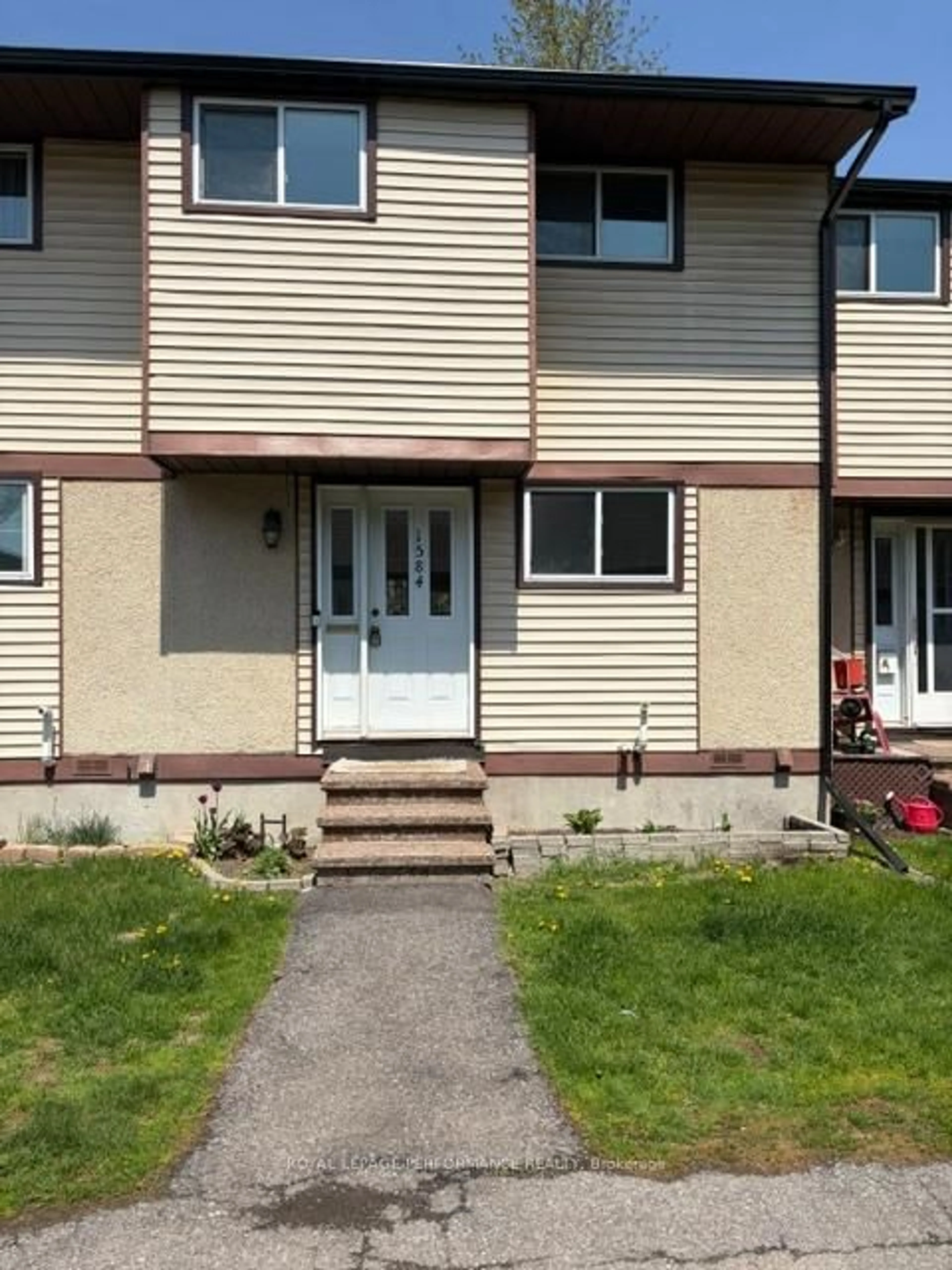 Home with vinyl exterior material, street for 1584 Feather Lane, Ottawa Ontario K1T 1V4