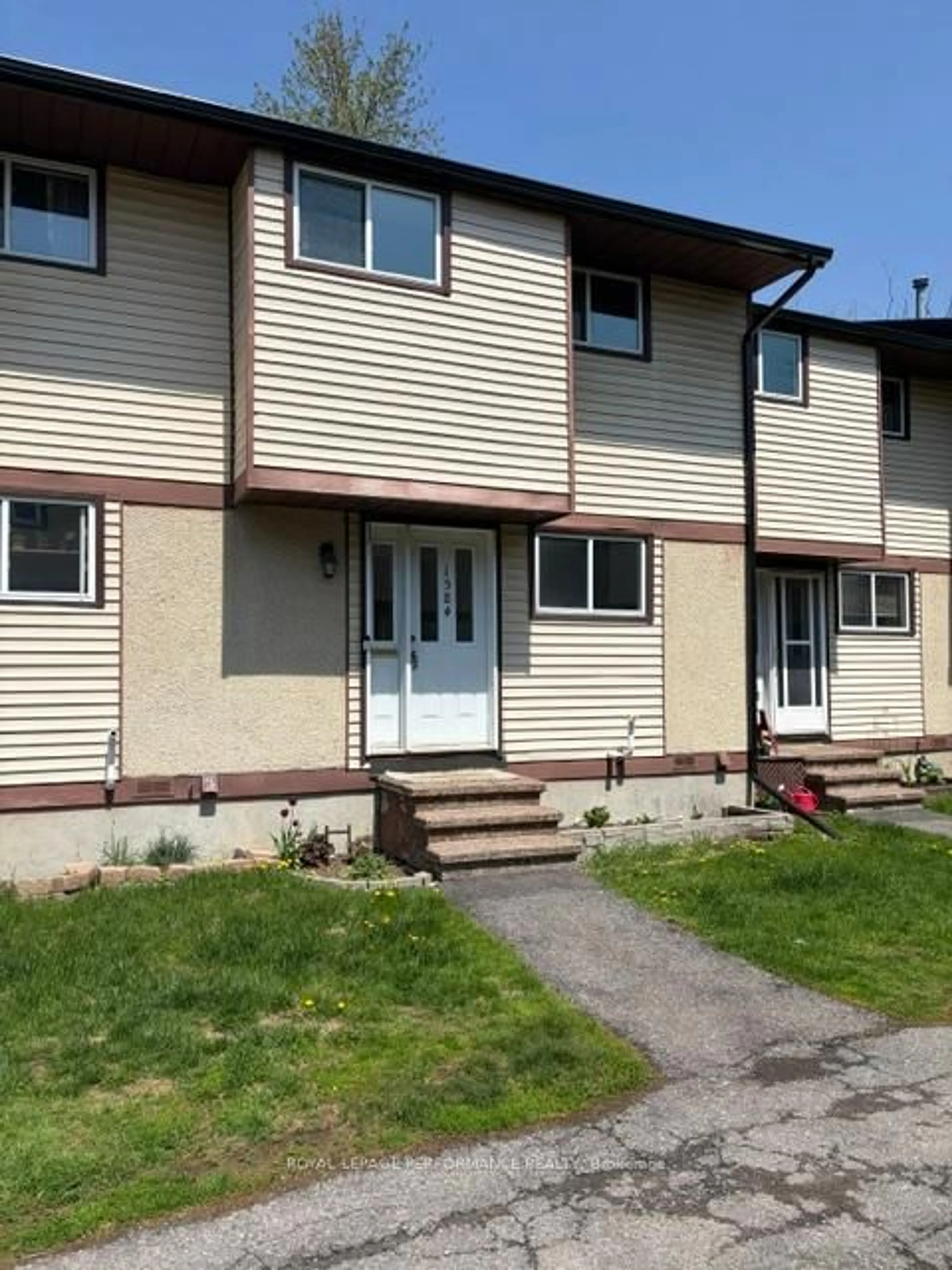 Home with vinyl exterior material, street for 1584 Feather Lane, Ottawa Ontario K1T 1V4