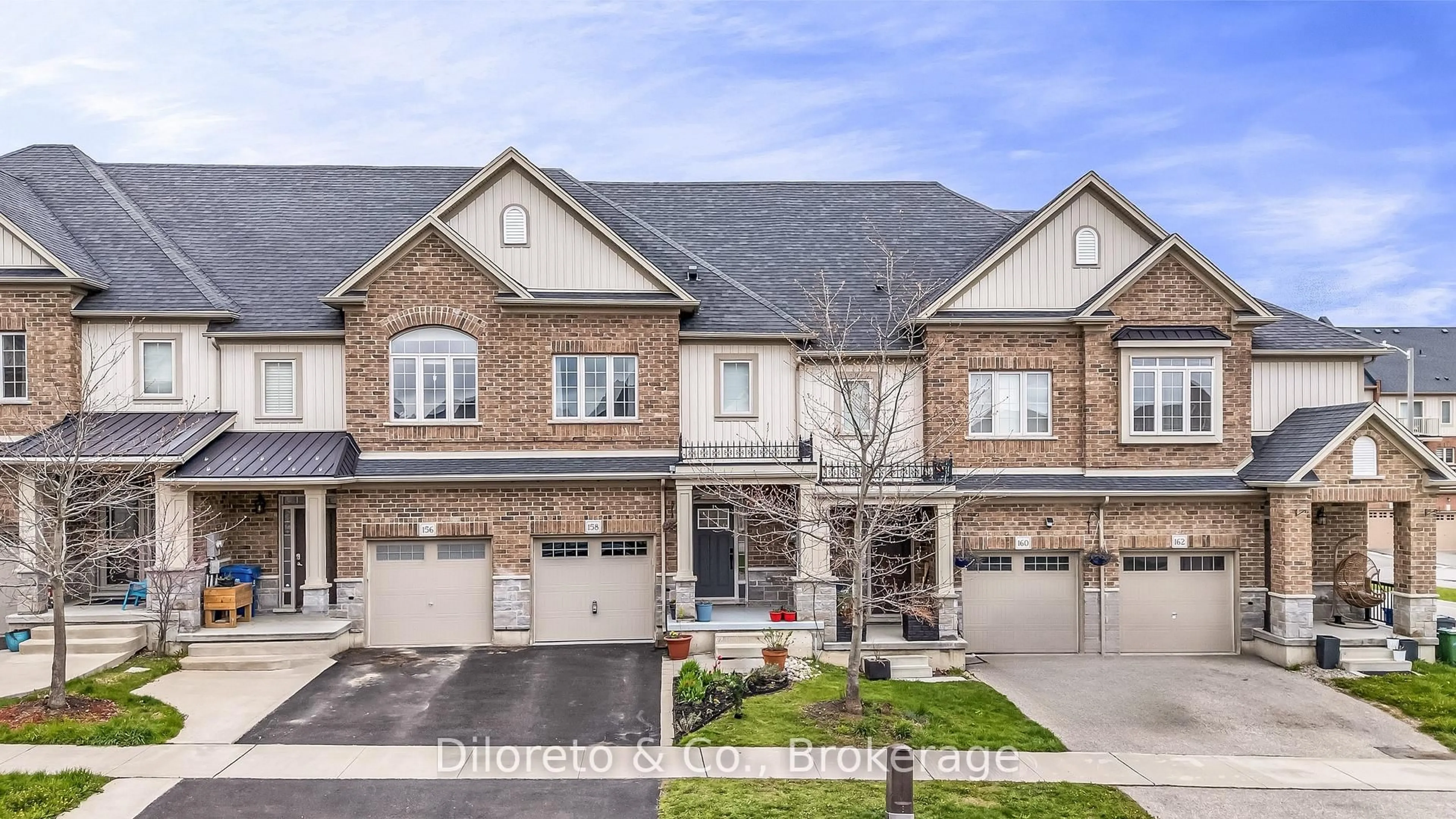 Home with brick exterior material, street for 158 Law Dr, Guelph Ontario N1E 0H5