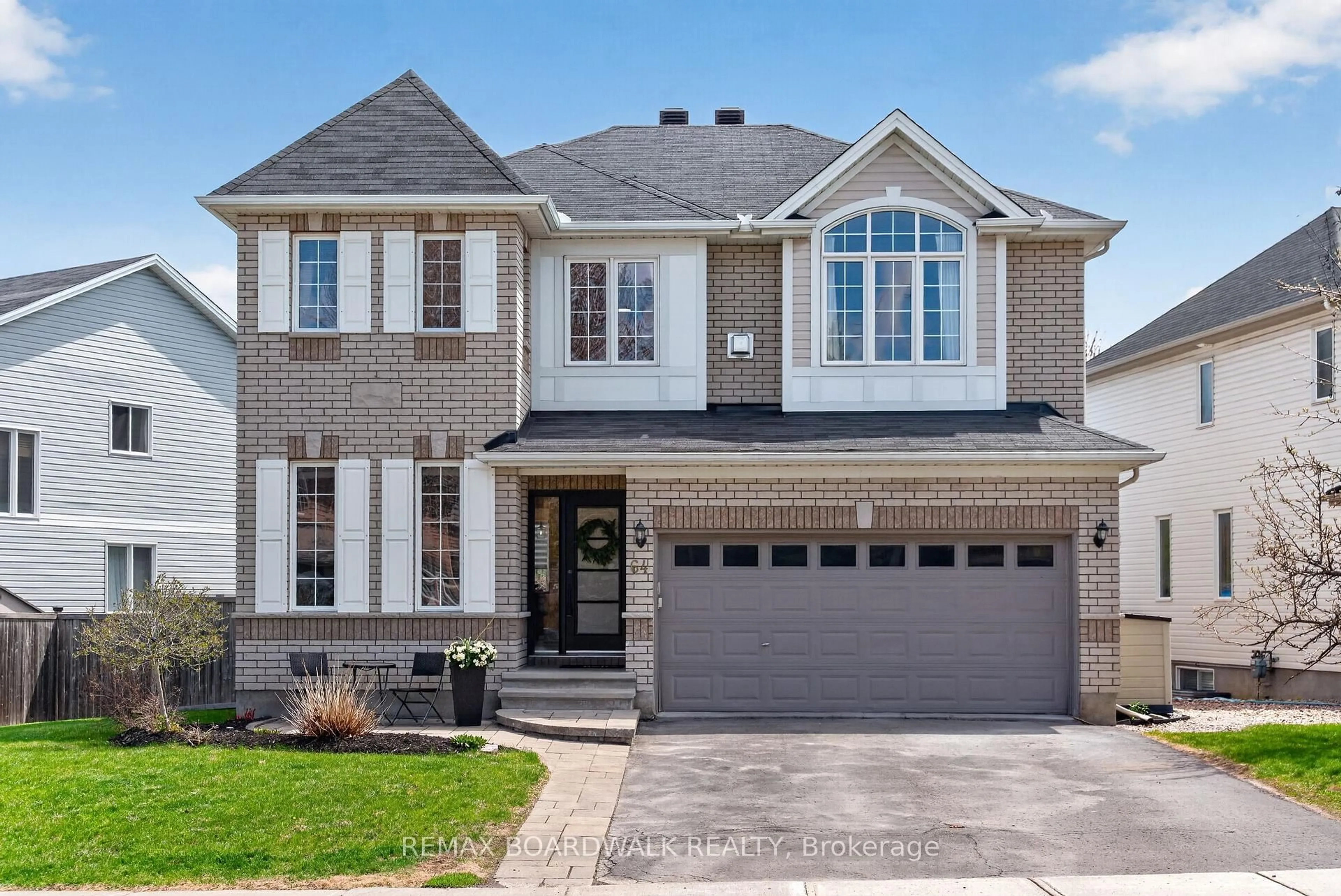 Home with brick exterior material, street for 64 Baywood Dr, Ottawa Ontario K2S 2H5