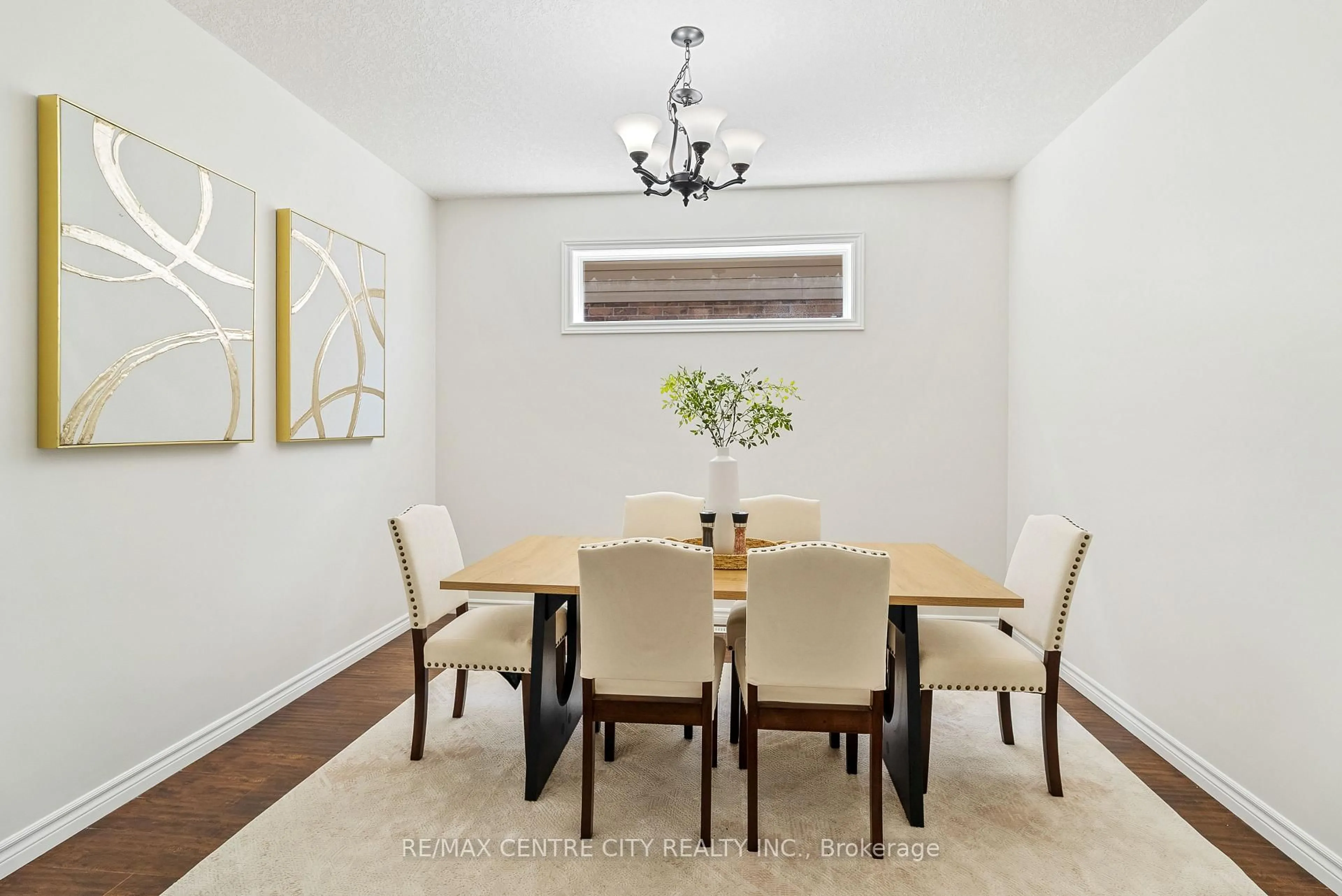 Dining room, wood/laminate floor for 1420 Howlett Circ, London North Ontario N5X 0K5