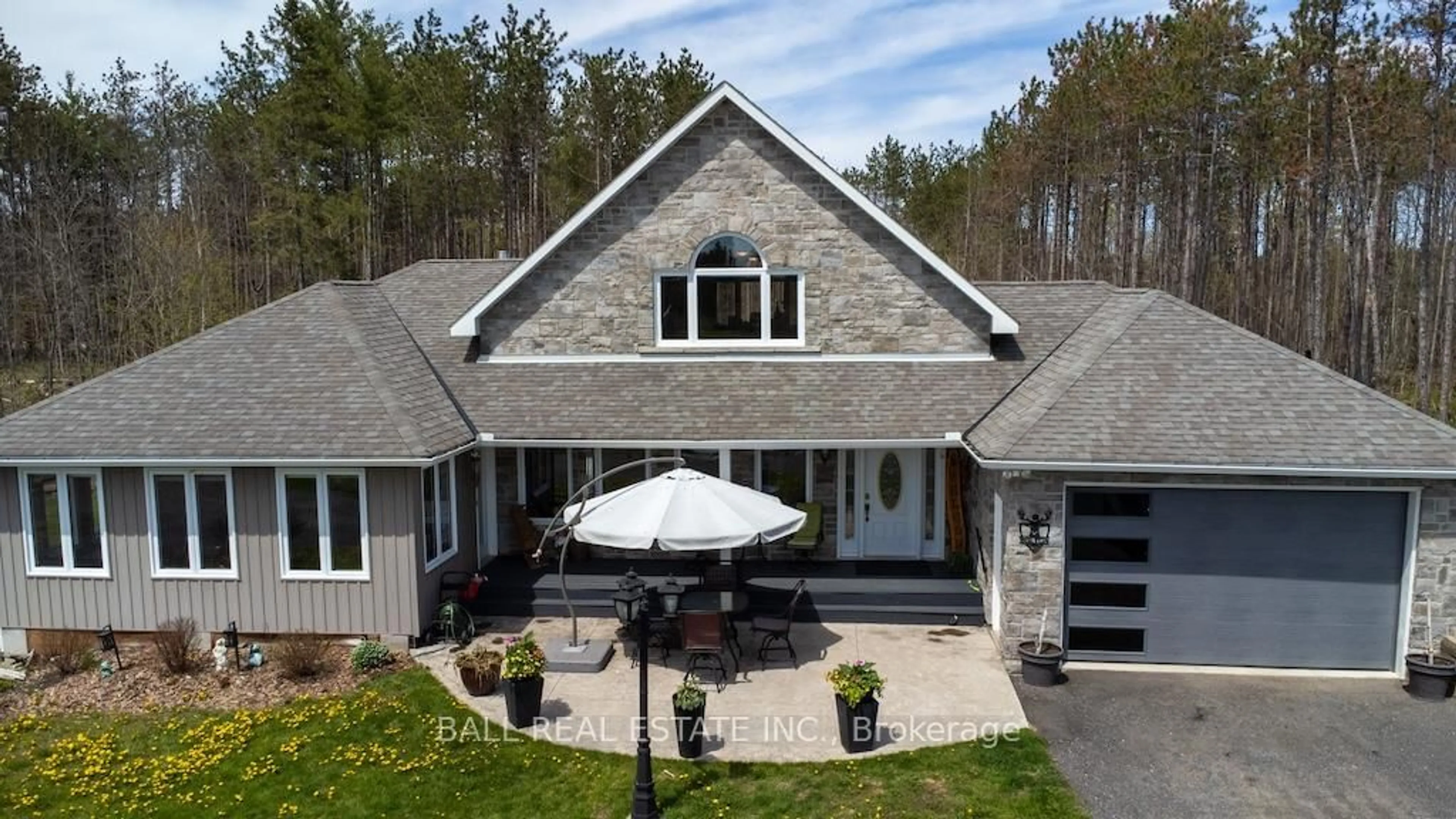 A pic from outside/outdoor area/front of a property/back of a property/a pic from drone, street for 6608 Highway 28, North Kawartha Ontario K0L 1A0