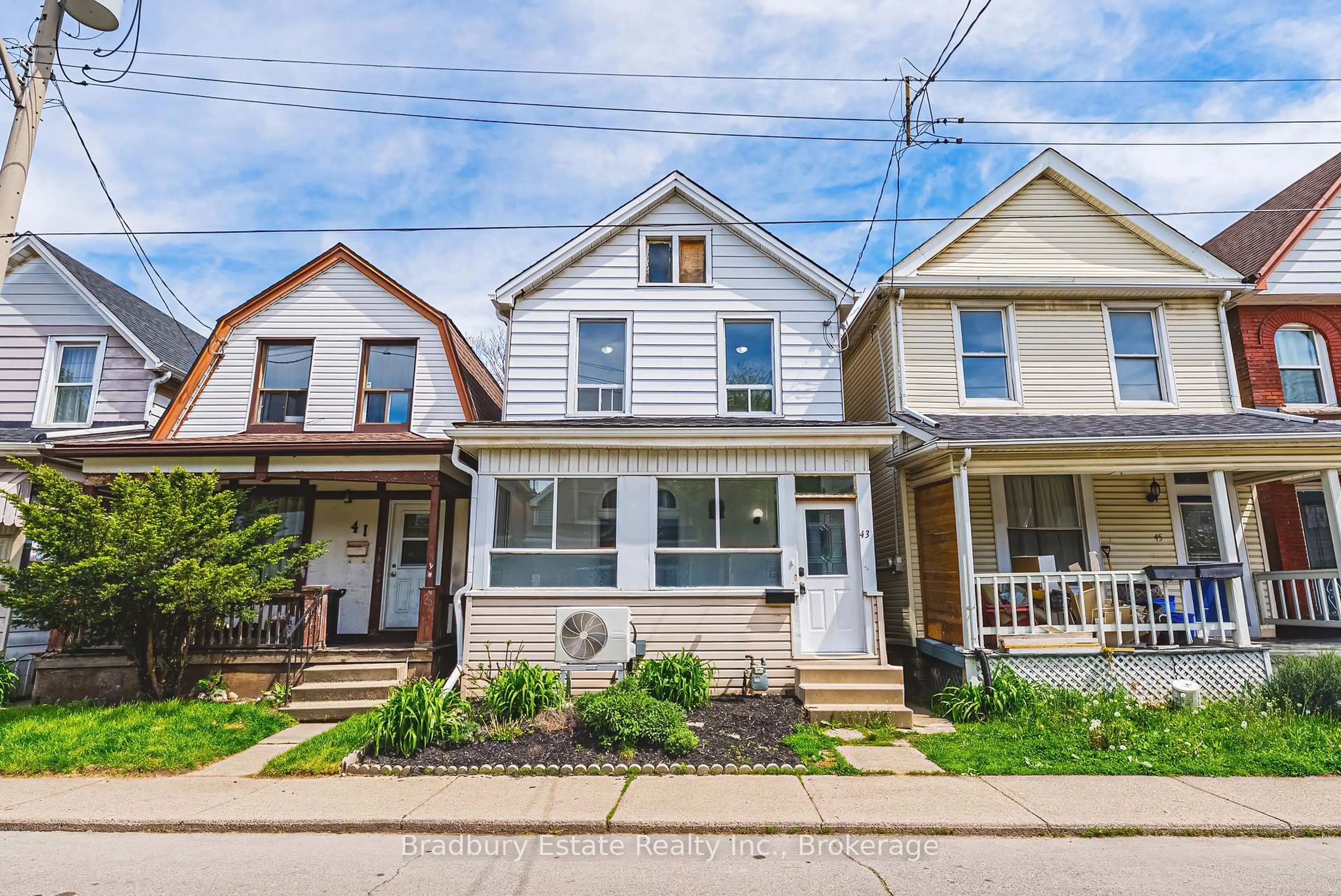 Home with vinyl exterior material, street for 43 Harvey St, Hamilton Ontario L8L 2L9