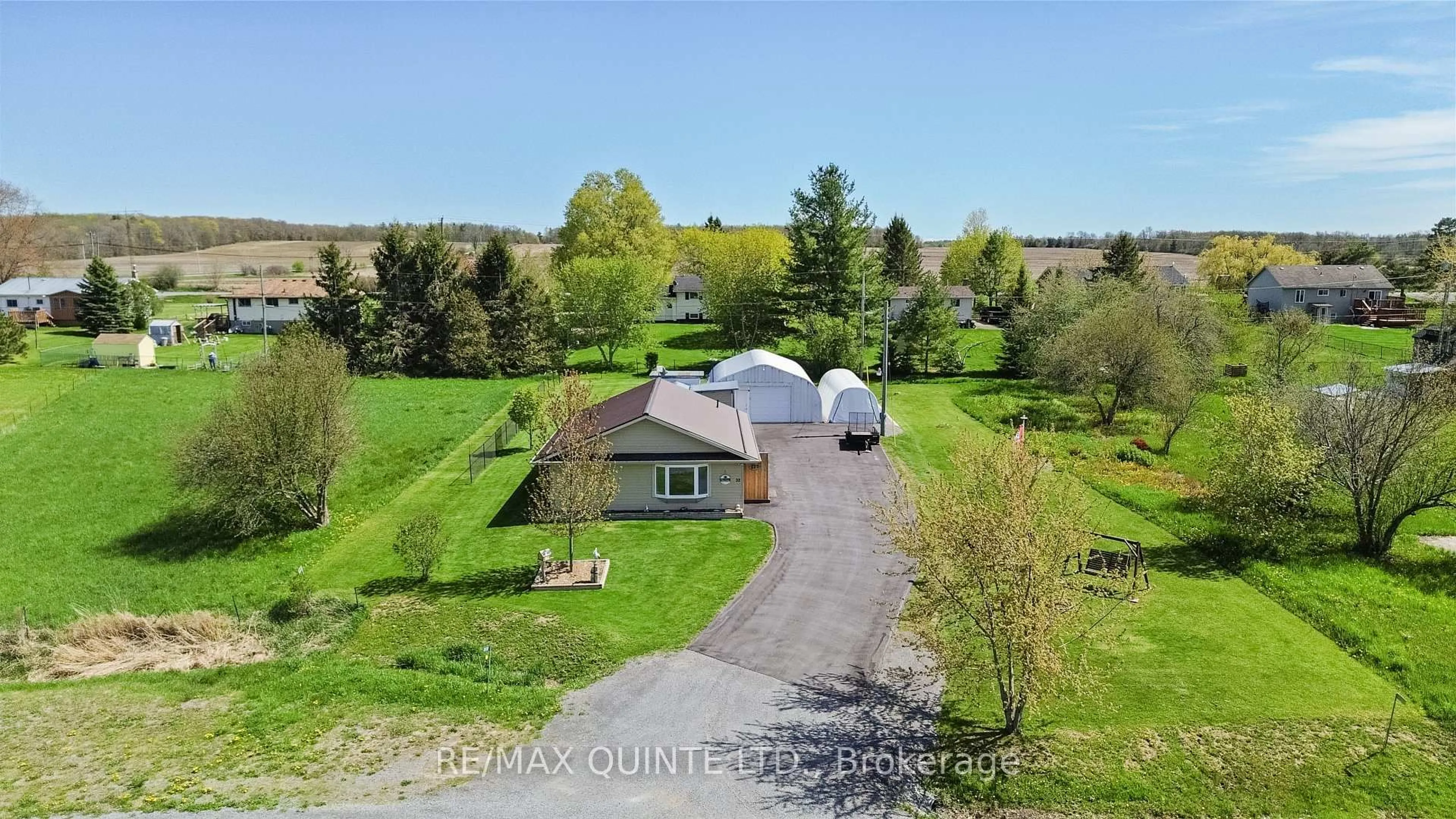 A pic from outside/outdoor area/front of a property/back of a property/a pic from drone, mountain view for 32 Dorland Dr, Napanee Ontario K7R 3K7