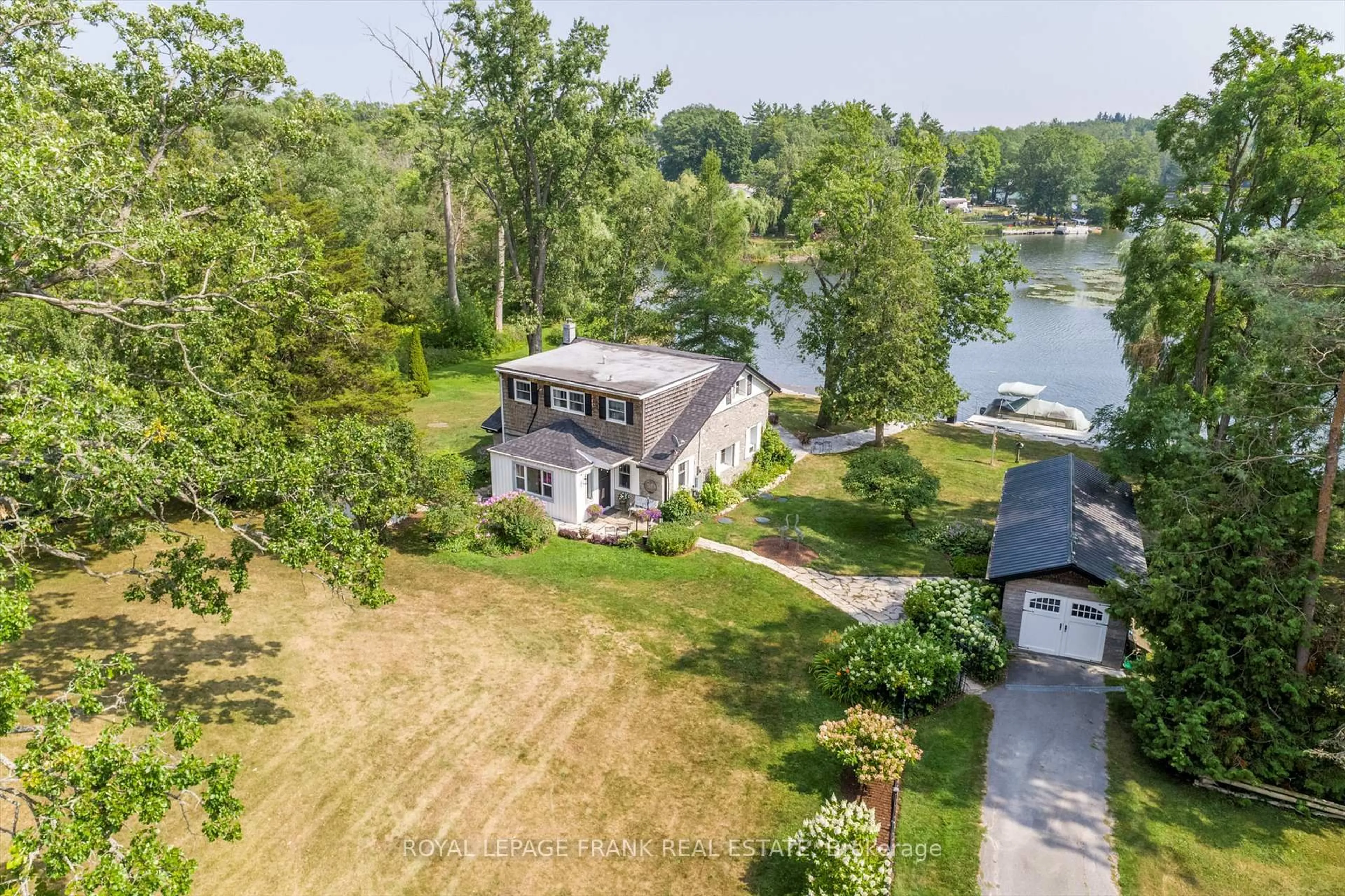 A pic from outside/outdoor area/front of a property/back of a property/a pic from drone, water/lake/river/ocean view for 891A Trent River Rd, Trent Hills Ontario K0L 1Z0