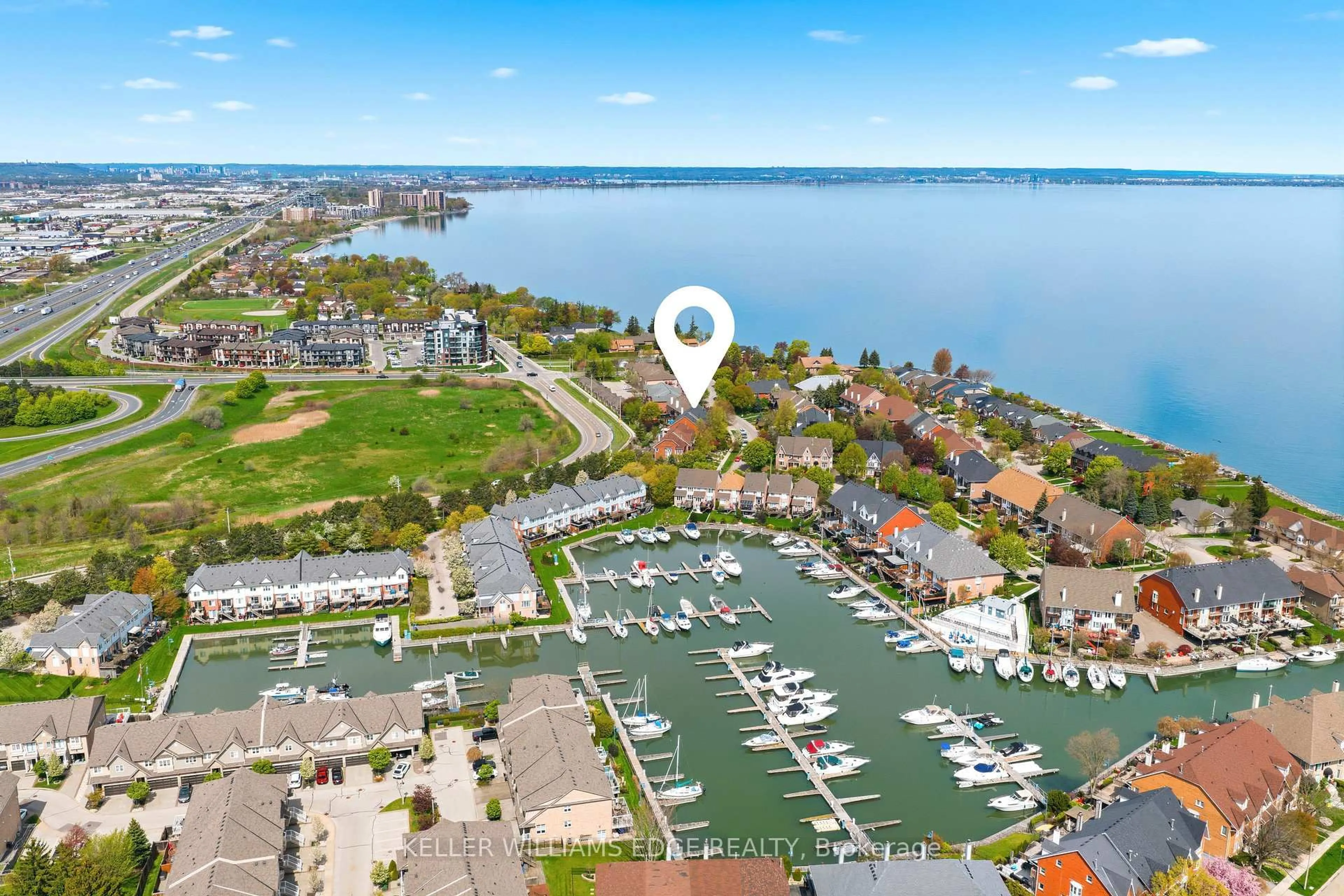 A pic from outside/outdoor area/front of a property/back of a property/a pic from drone, water/lake/river/ocean view for 14 Harbour Dr, Hamilton Ontario L8E 4Z5
