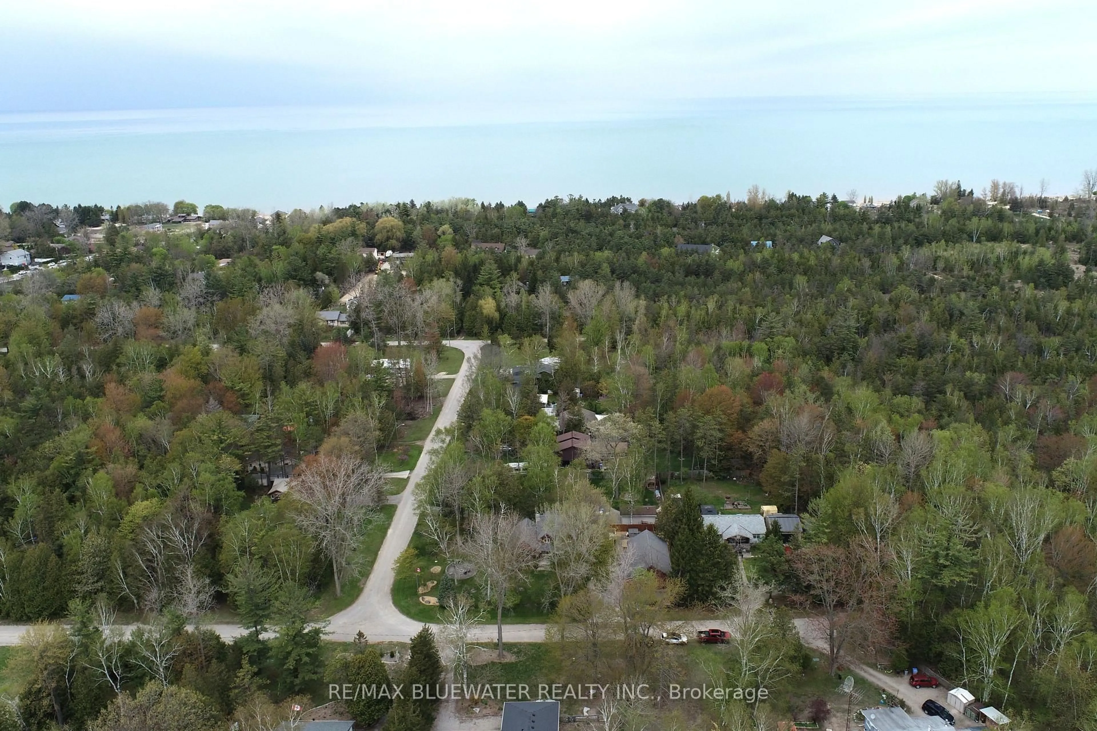 A pic from outside/outdoor area/front of a property/back of a property/a pic from drone, forest/trees view for 6436 Robert Ave, Lambton Shores Ontario N0N 1J2