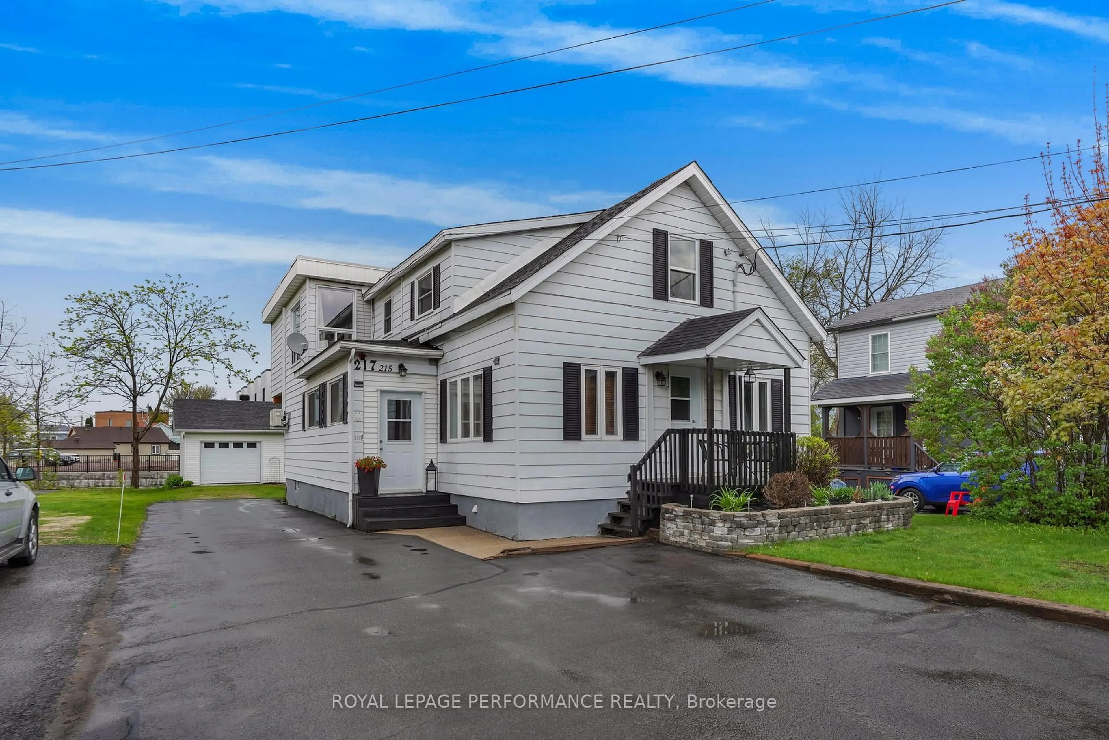 Home with vinyl exterior material, street for 215-217 Nelson St, Hawkesbury Ontario K6A 1L6