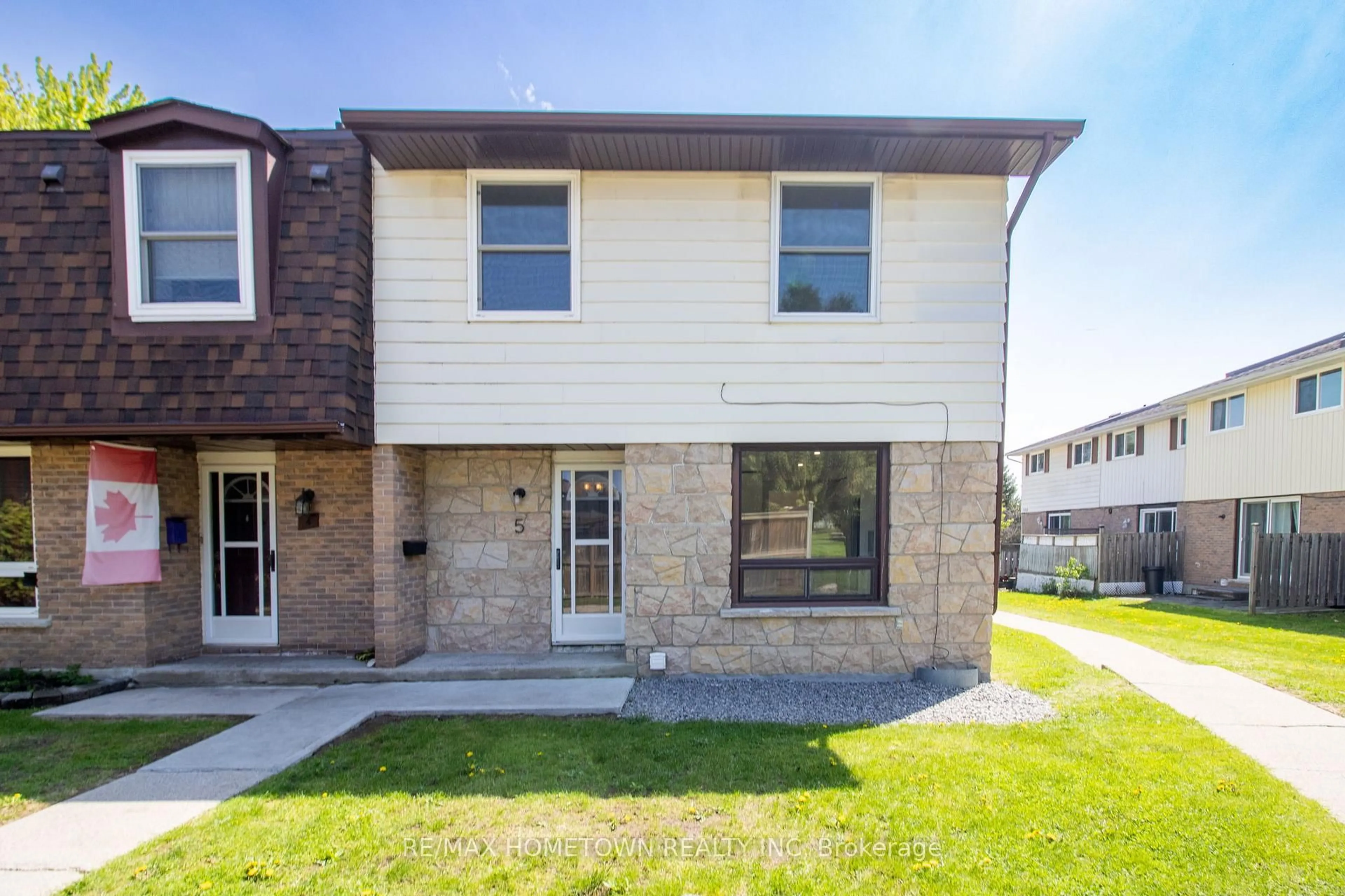 Home with brick exterior material, street for 1293 Vista Dr #5, Brockville Ontario K6V 6G2